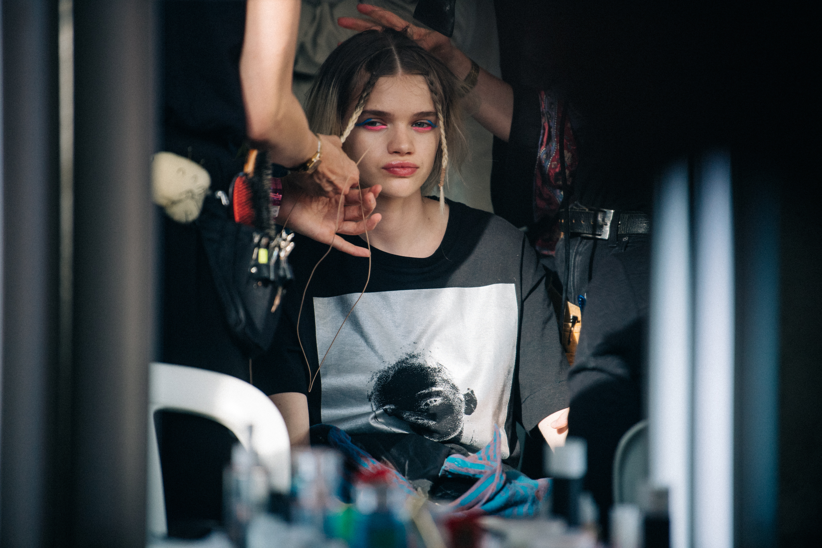 Model in hair and makeup backstage