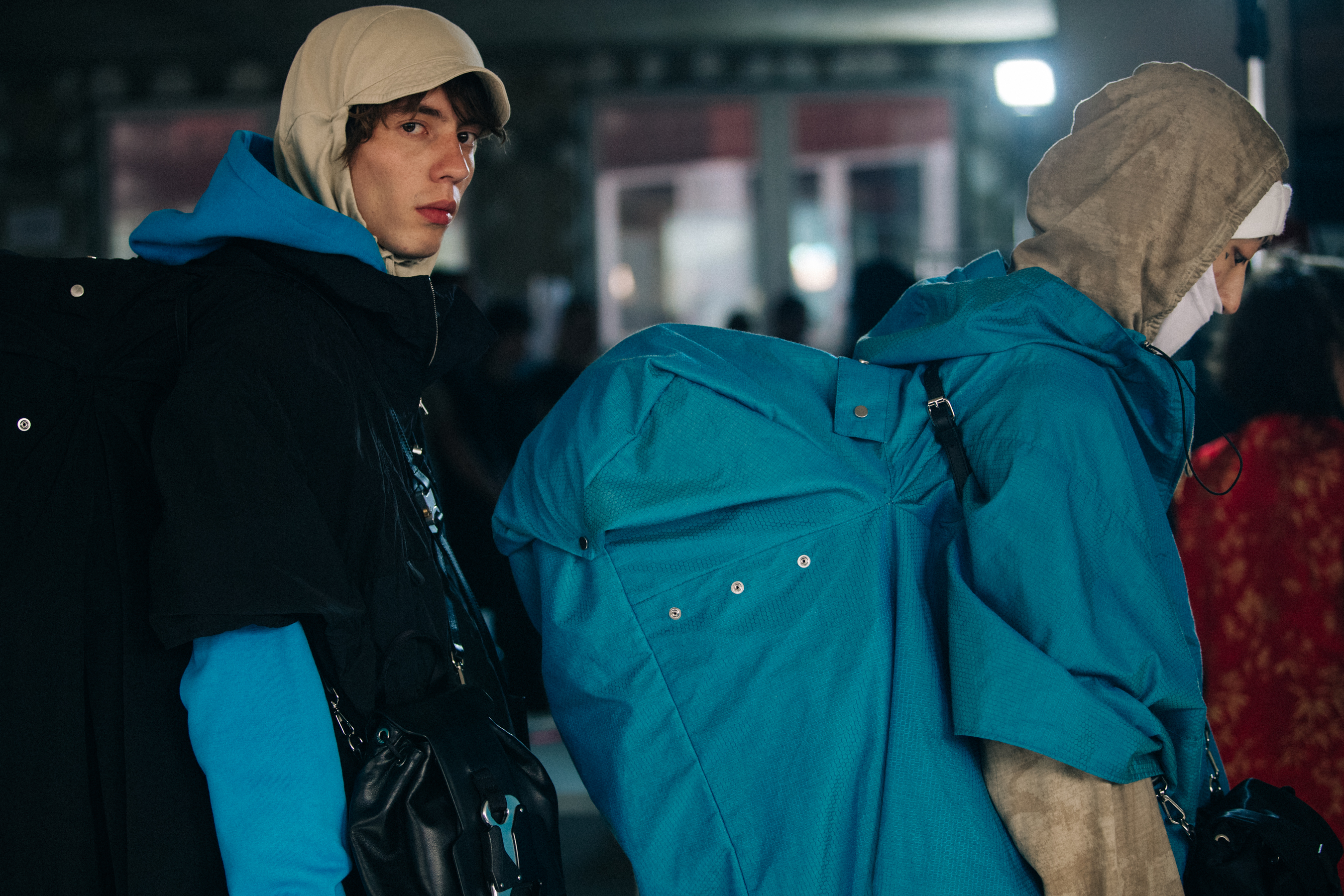 Models backstage wearing blue at Alyx