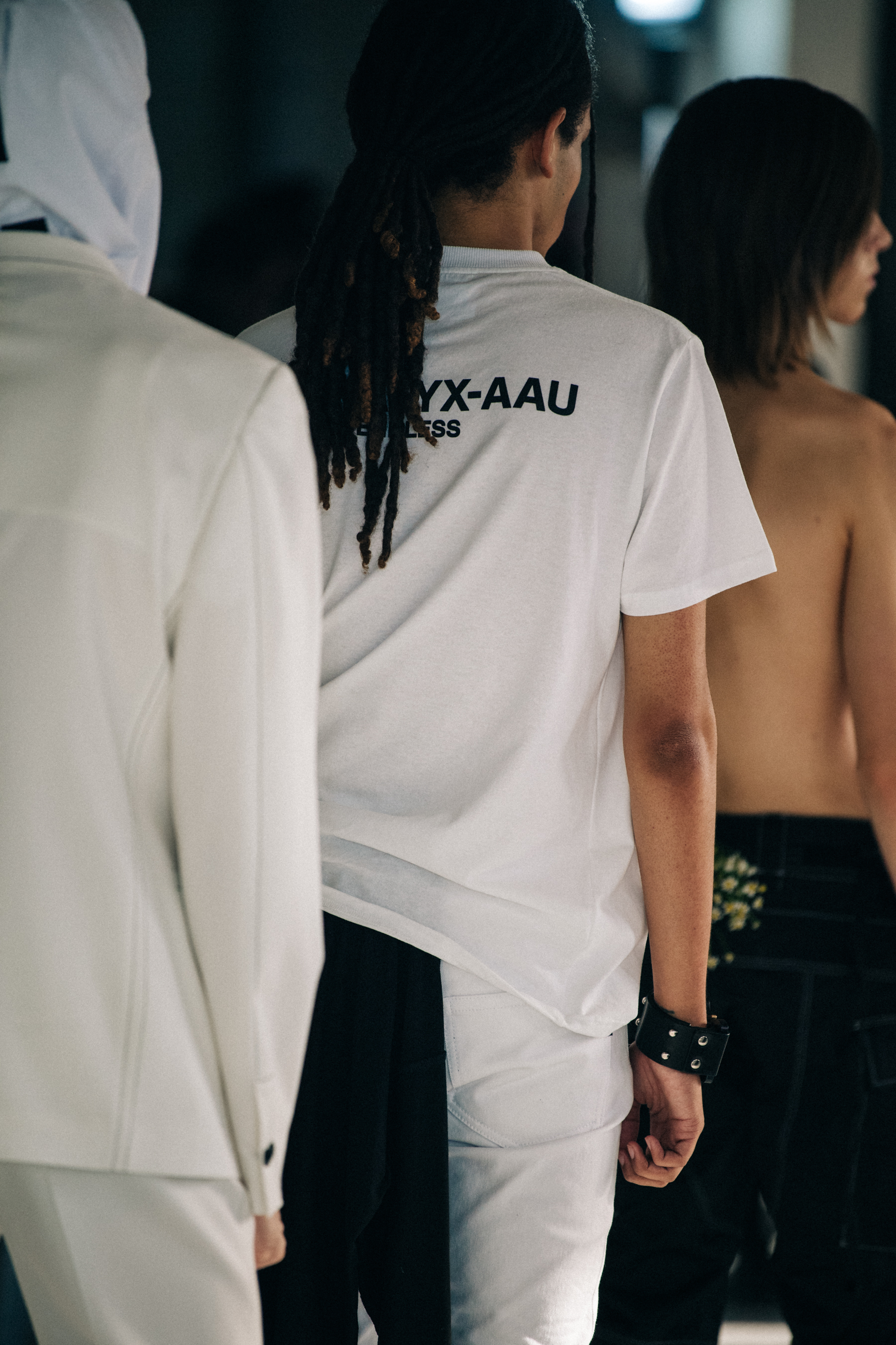 Model wearing white Alyx outfit