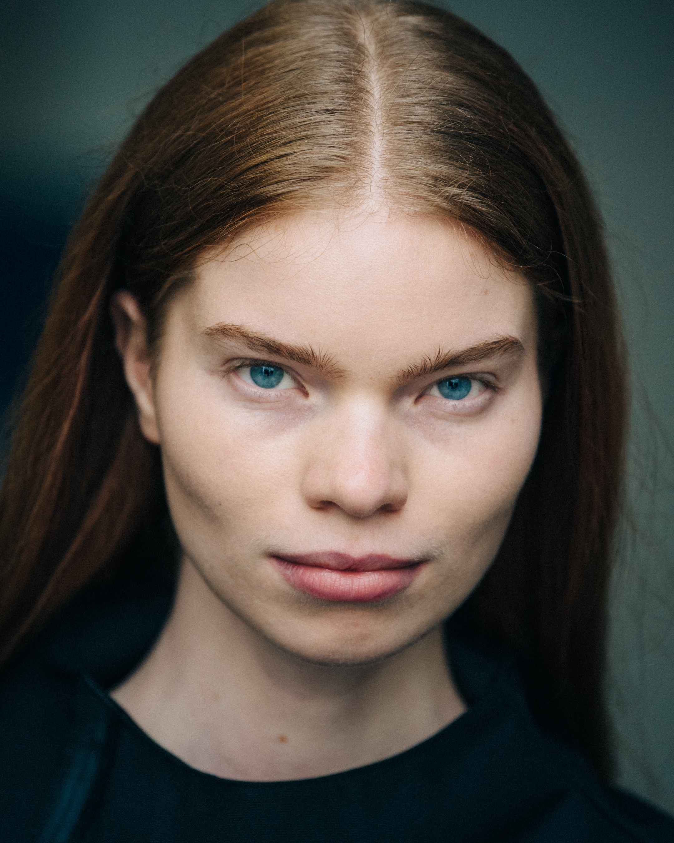 Portrait of model with long red hair