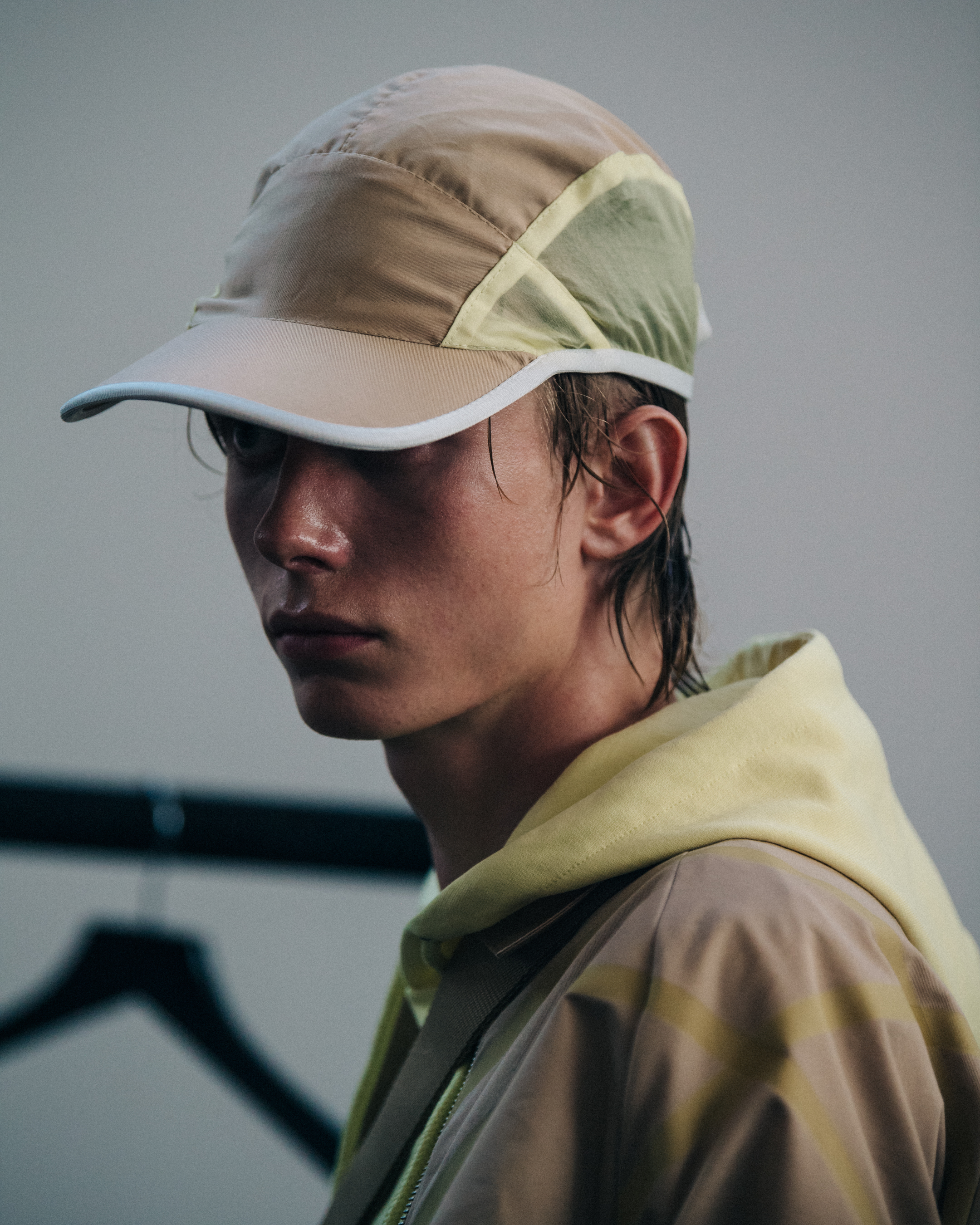 Model wearing yellow Cottweiler outfit