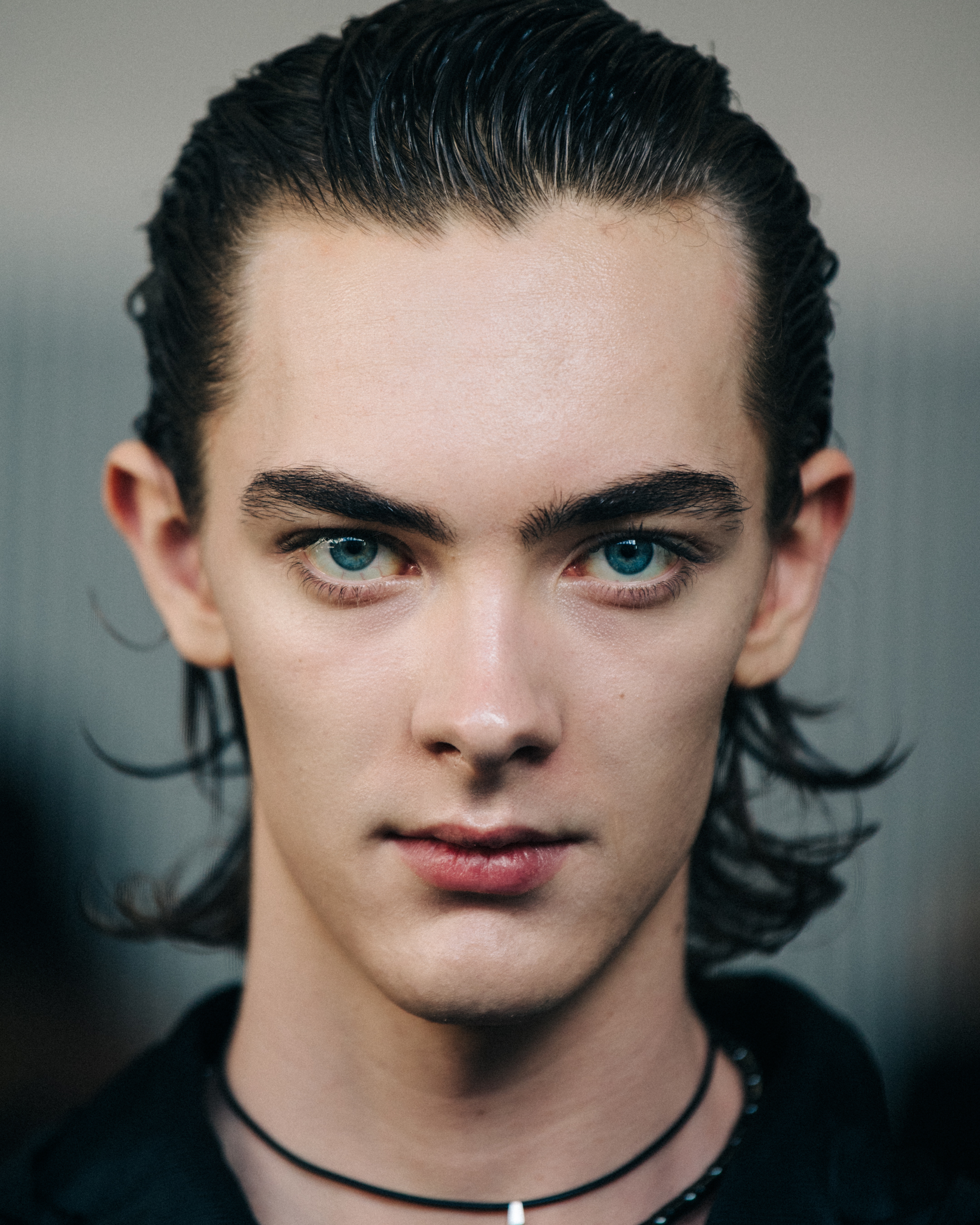 Portrait of model with long dark hair