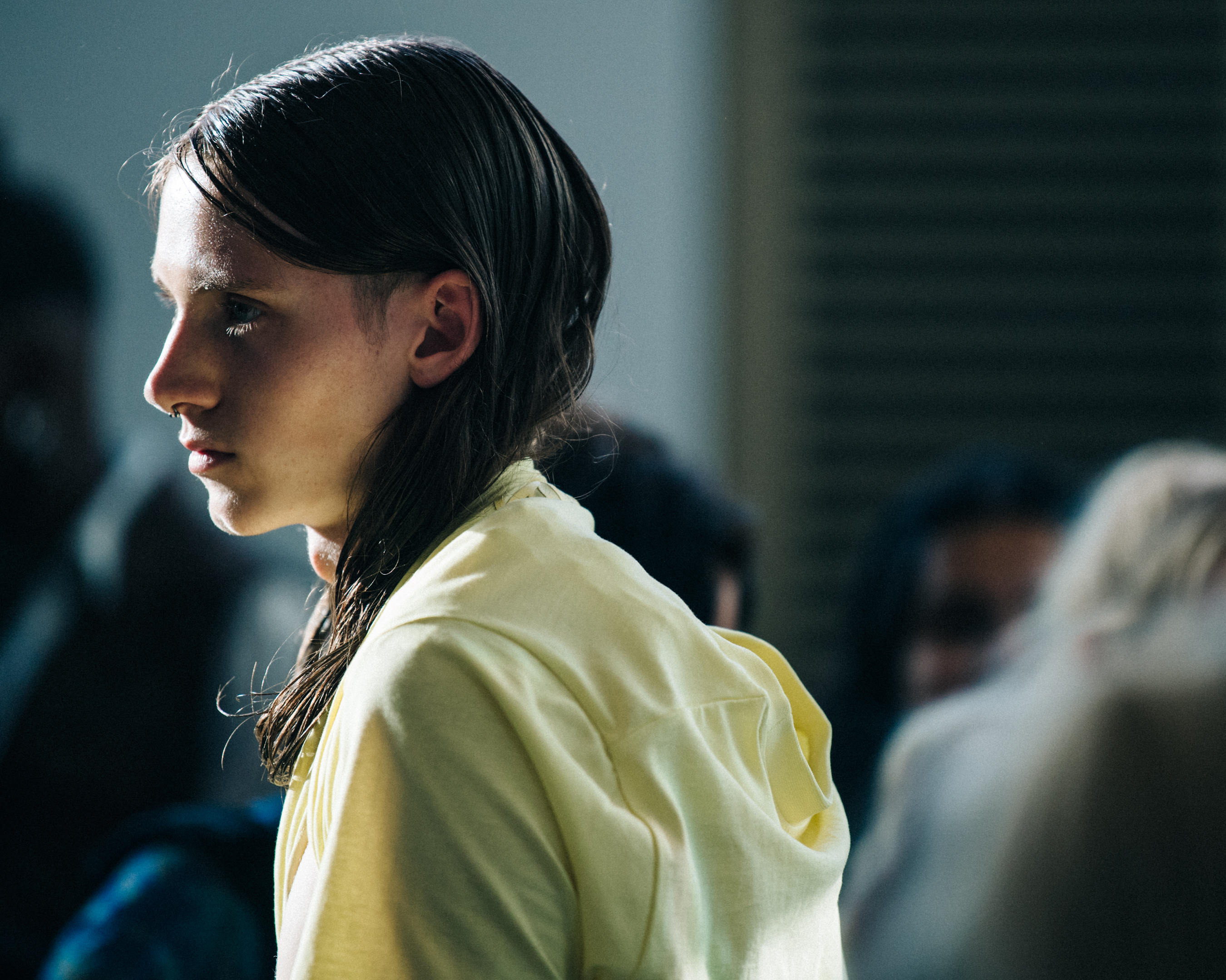 Model wearing yellow Cottweiler outfit