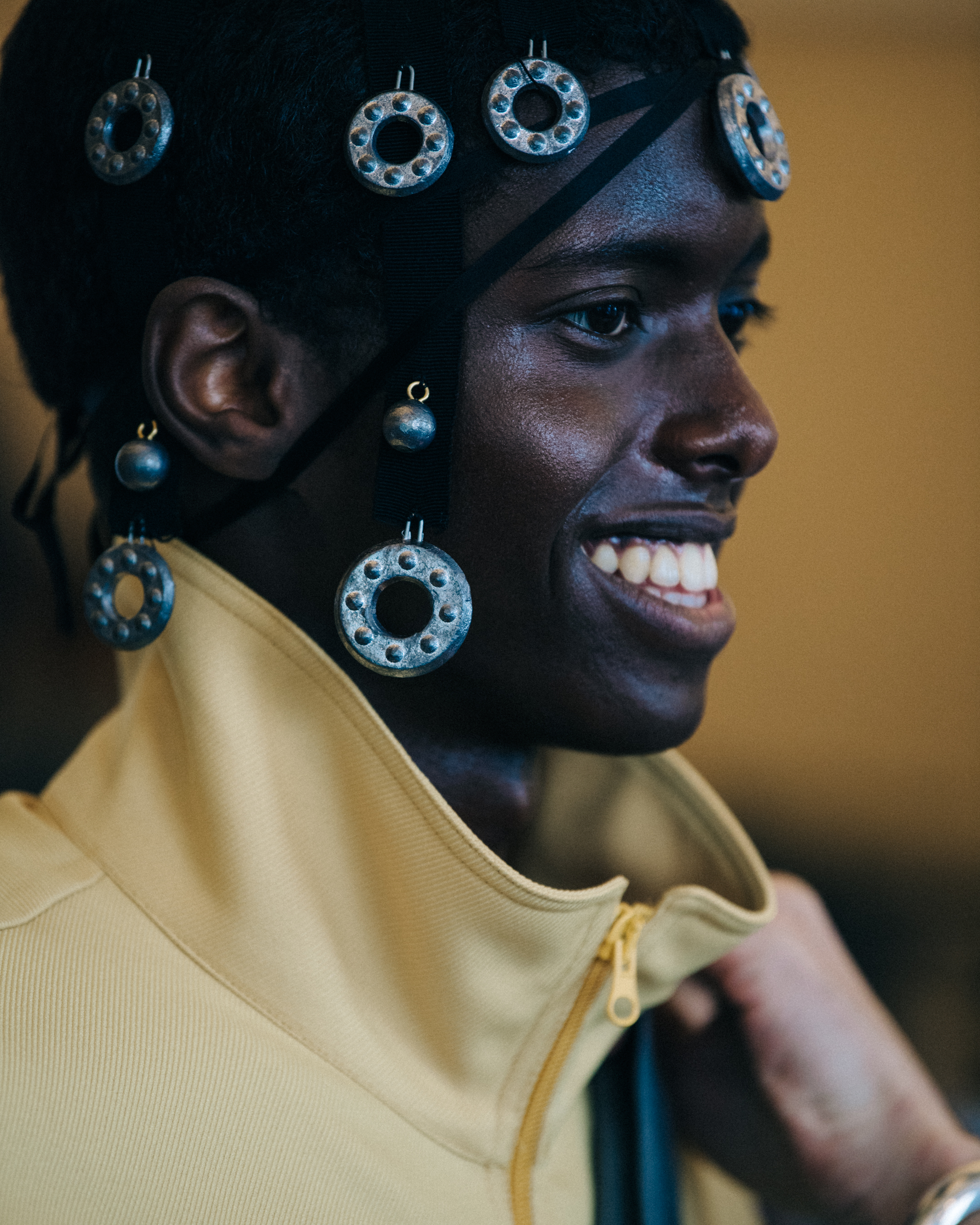 Model wearing metal hair jewellery backstage