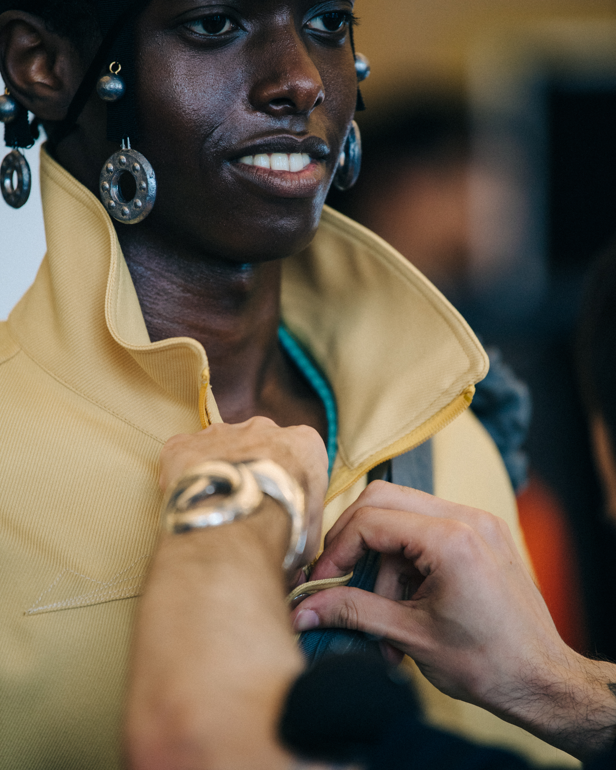 Model wearing metal hair jewellery backstage
