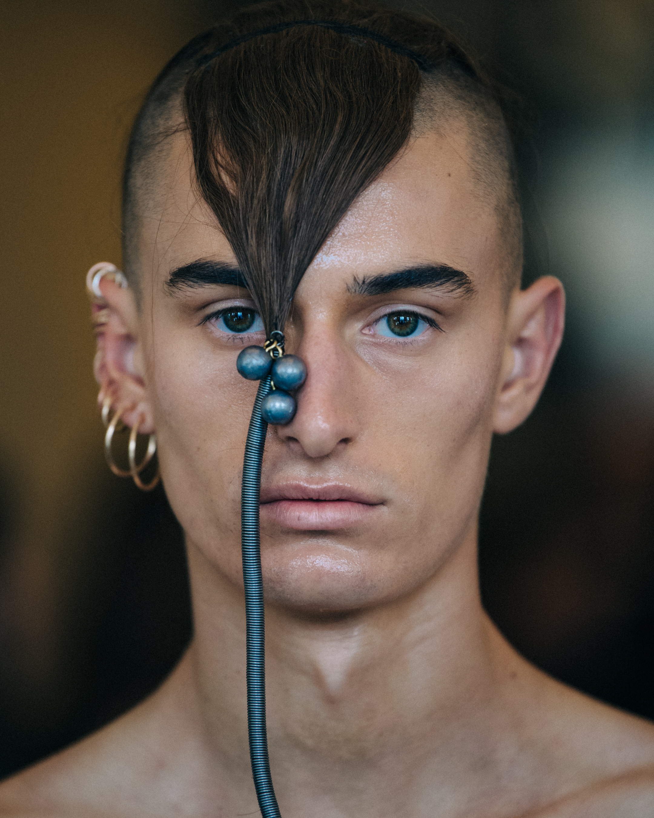 Portrait of model with metal hair accessories