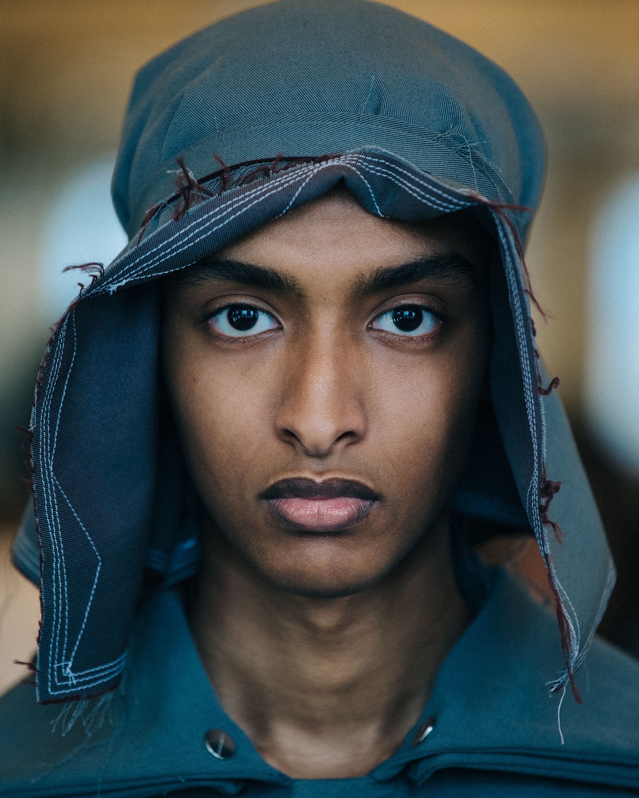Portrait of model wearing hood