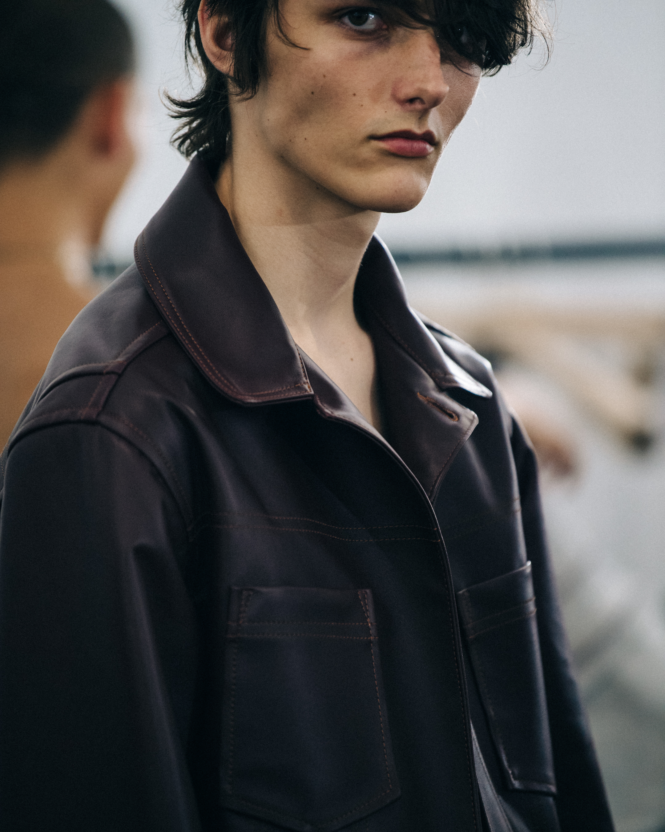 Model with brown fringe at Qasimi