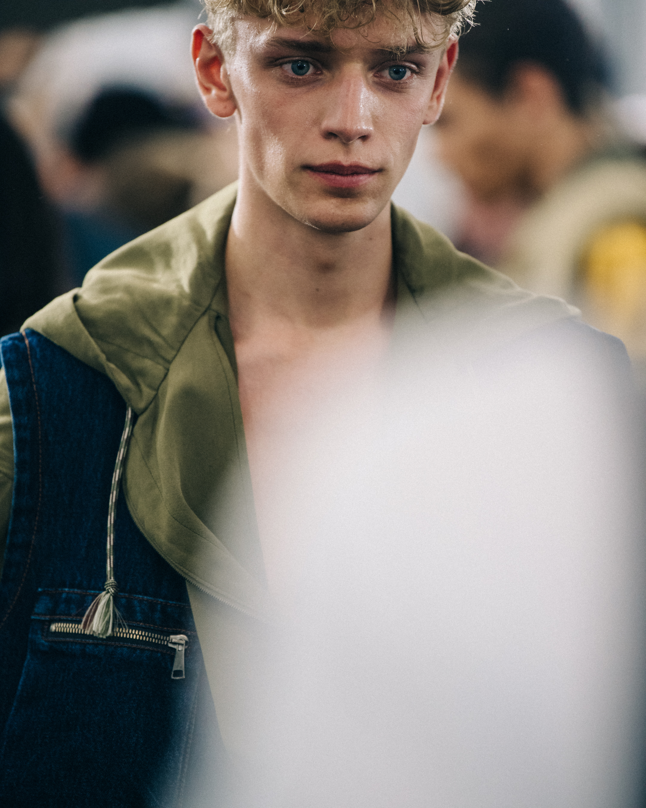 Model with curly blonde hair