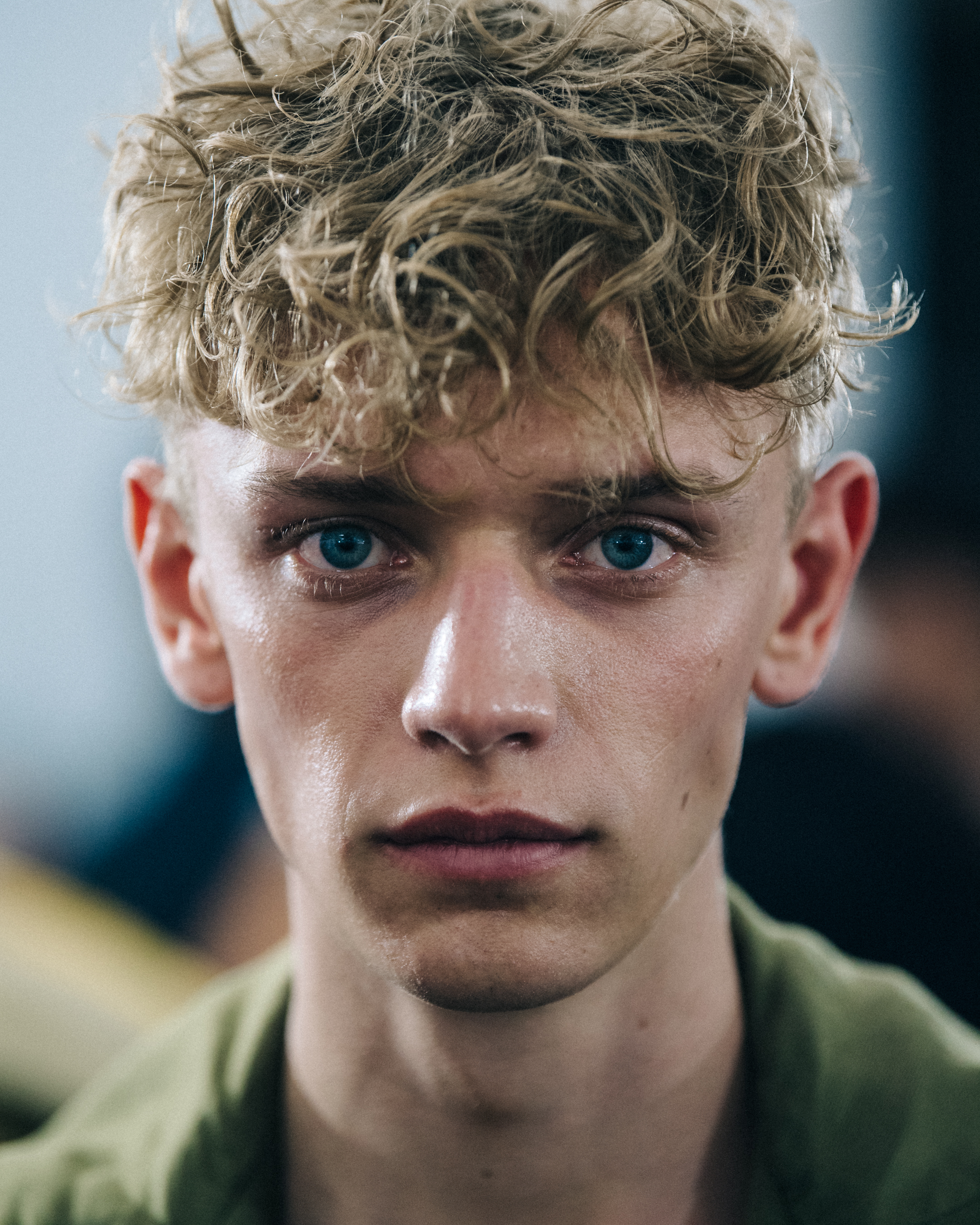 Portrait of model with curly blonde hair