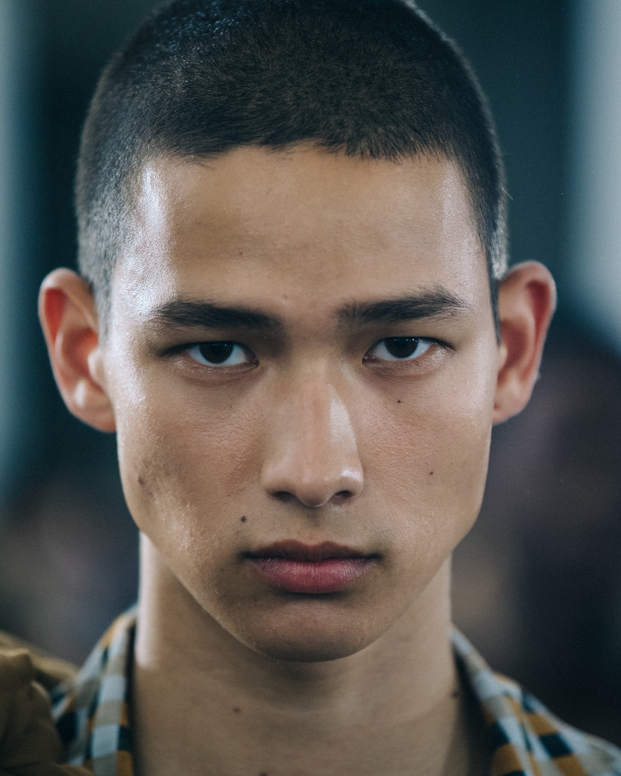 Portrait of model with shaved head