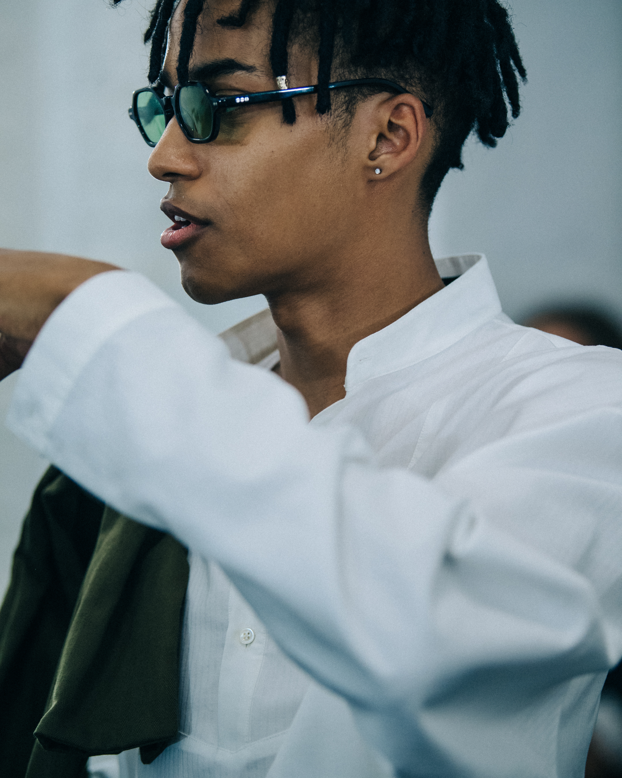 Model wearing white shirt