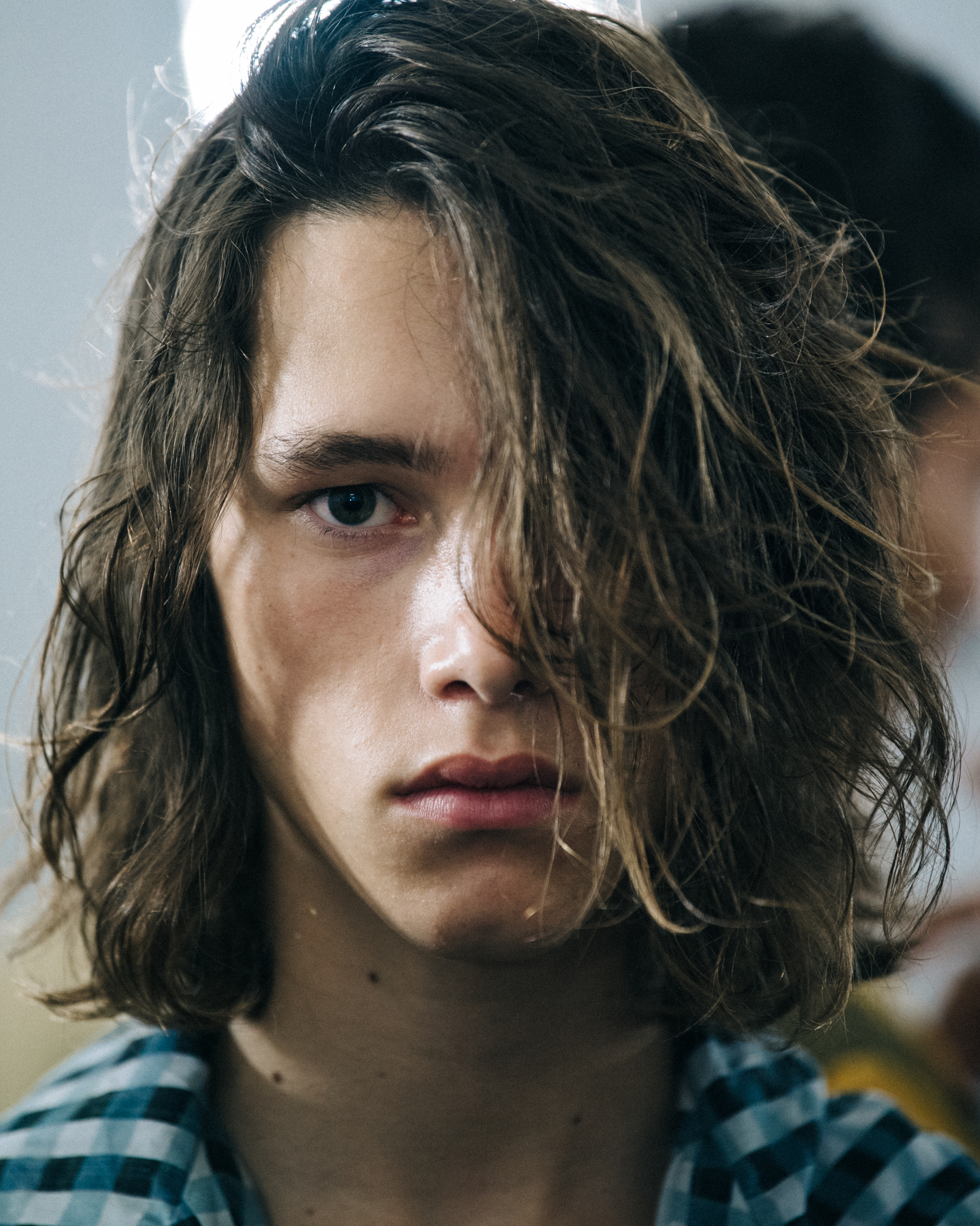 Portrait of model with thick curly hair