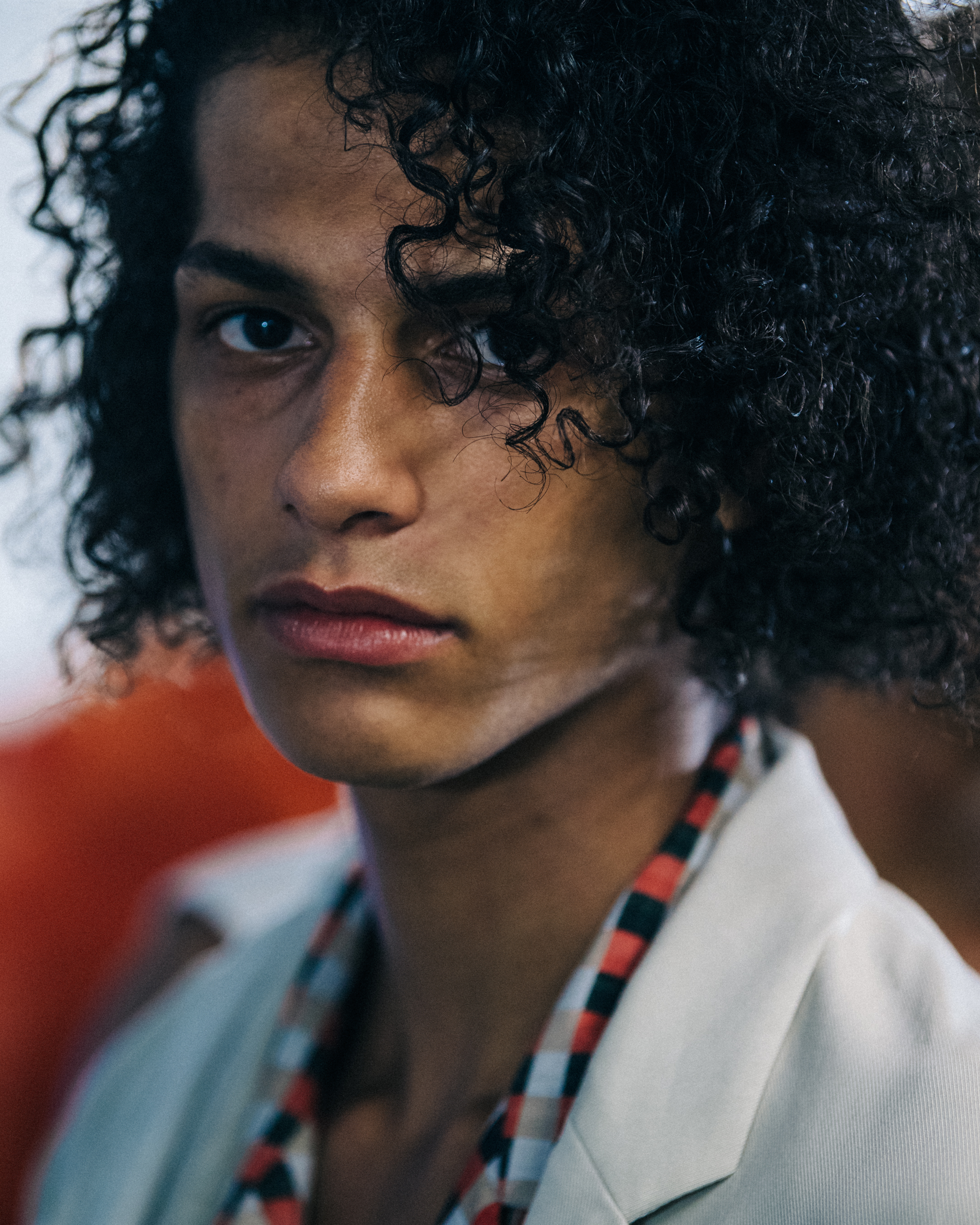 Model with curly thick hair
