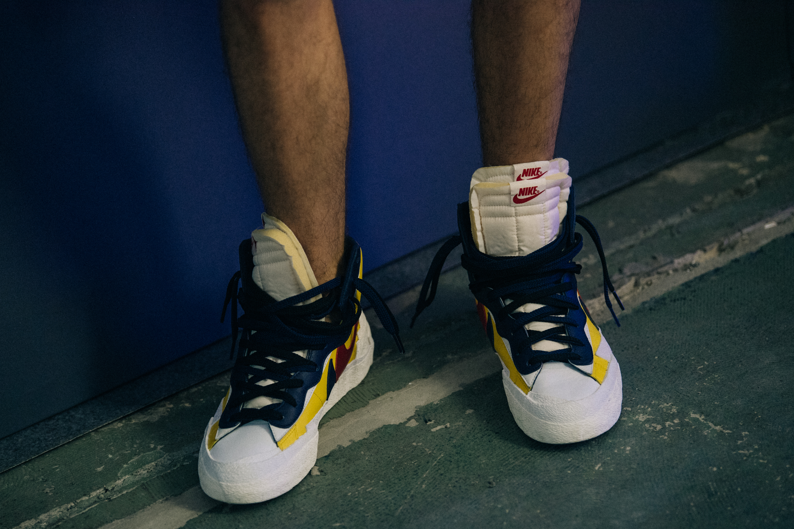 Models wearing Nike x Sacai sneakers