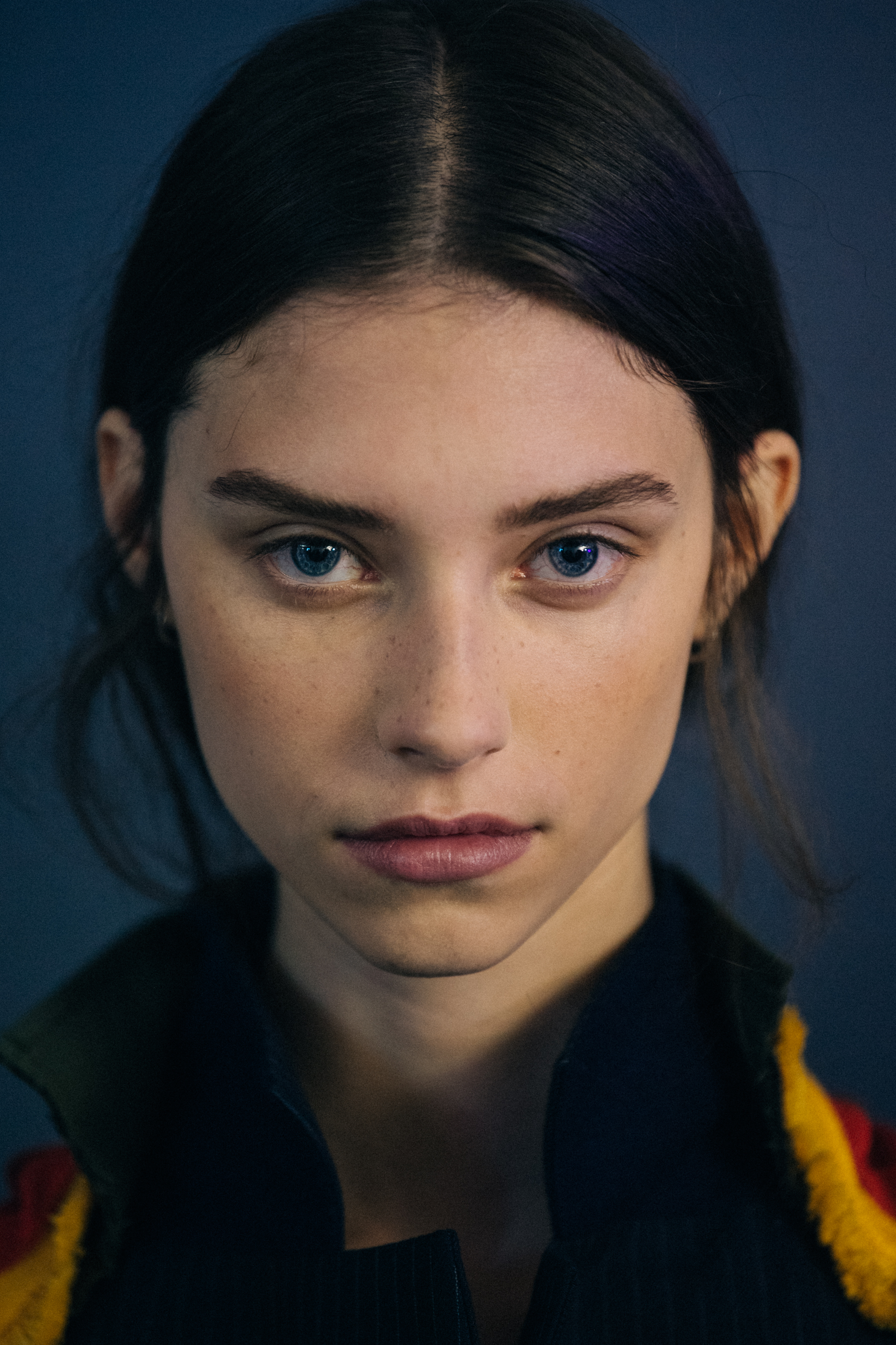 Portrait of model with tied back hair