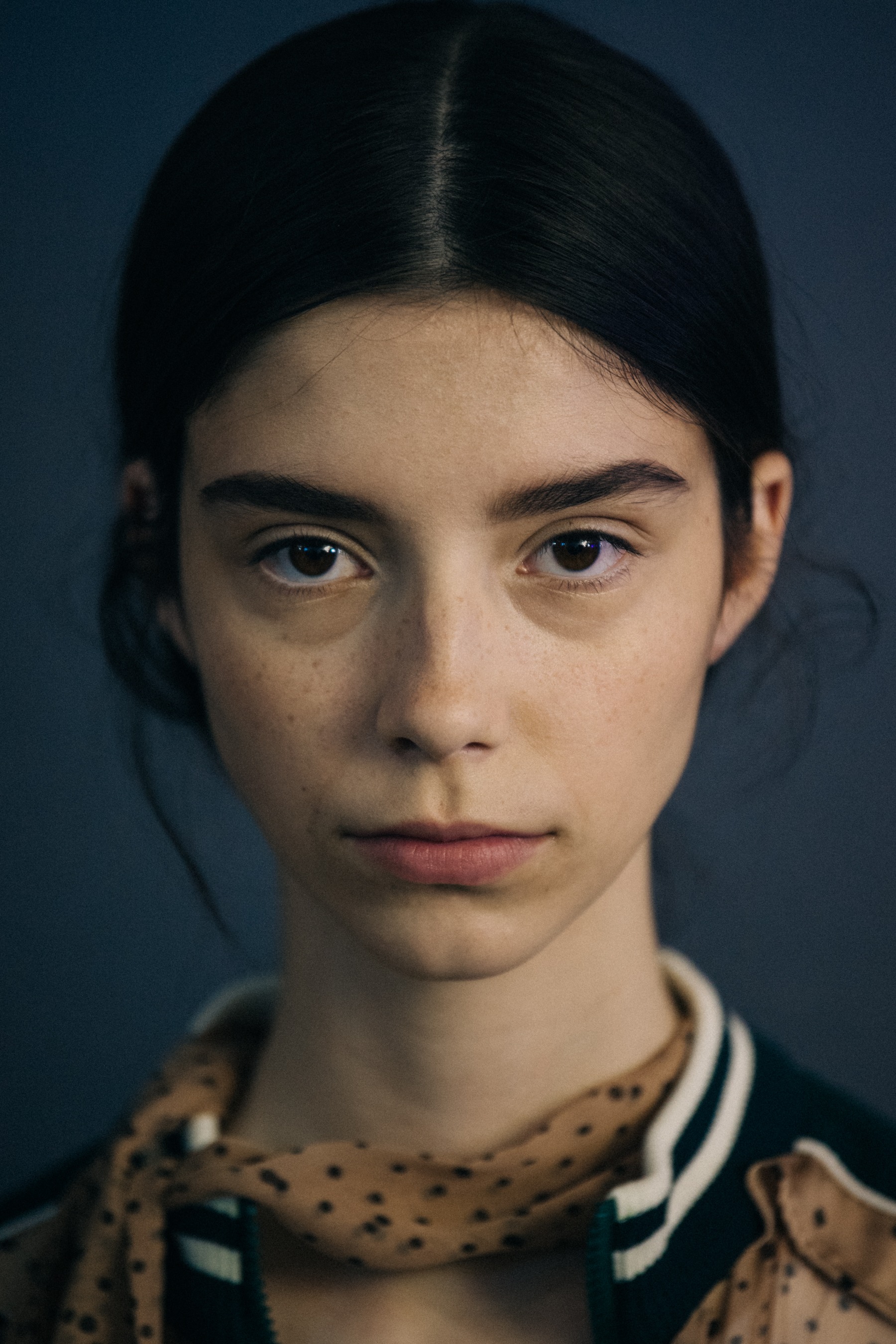 Portrait of model with tied back hair