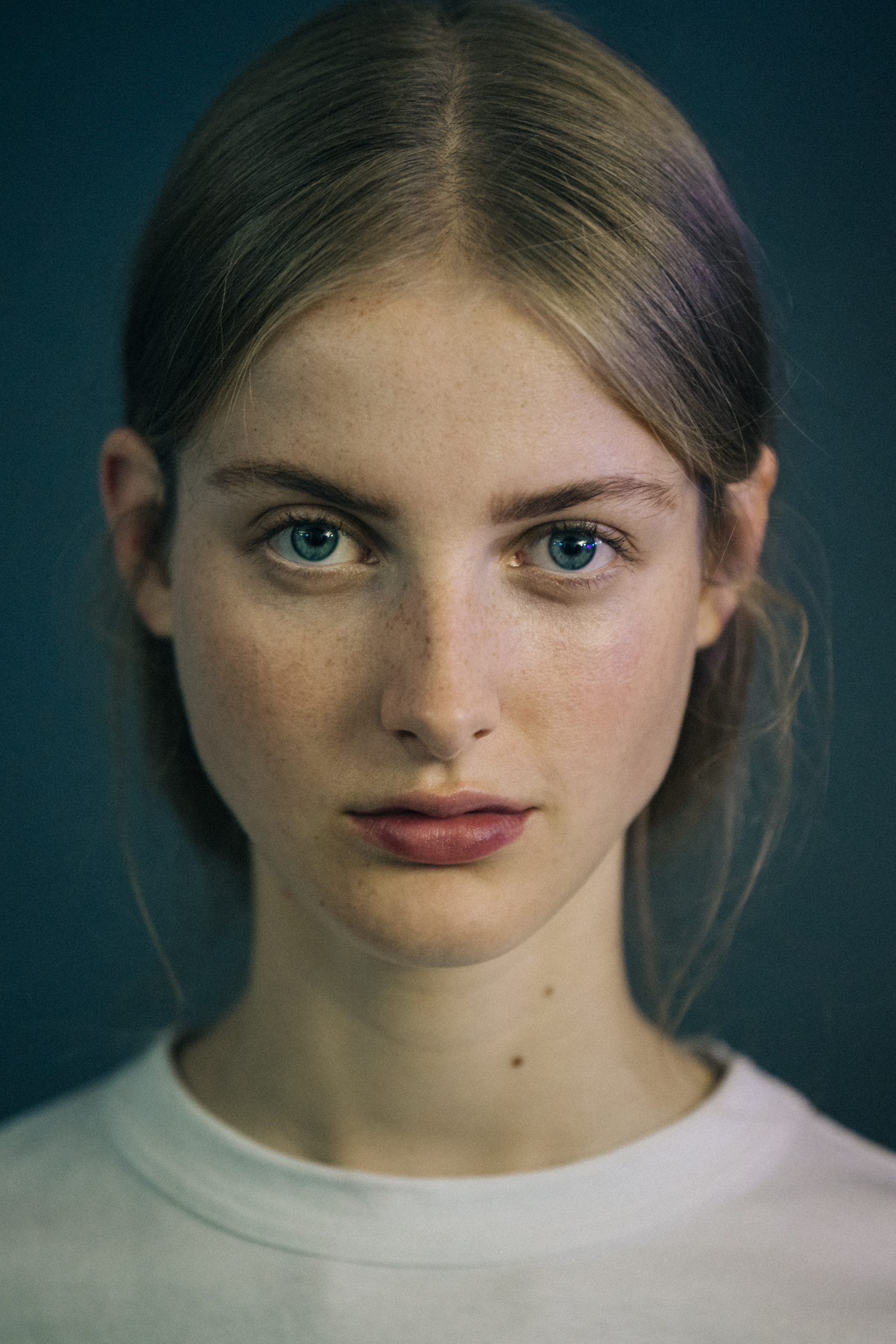 Portrait of model with tied back hair