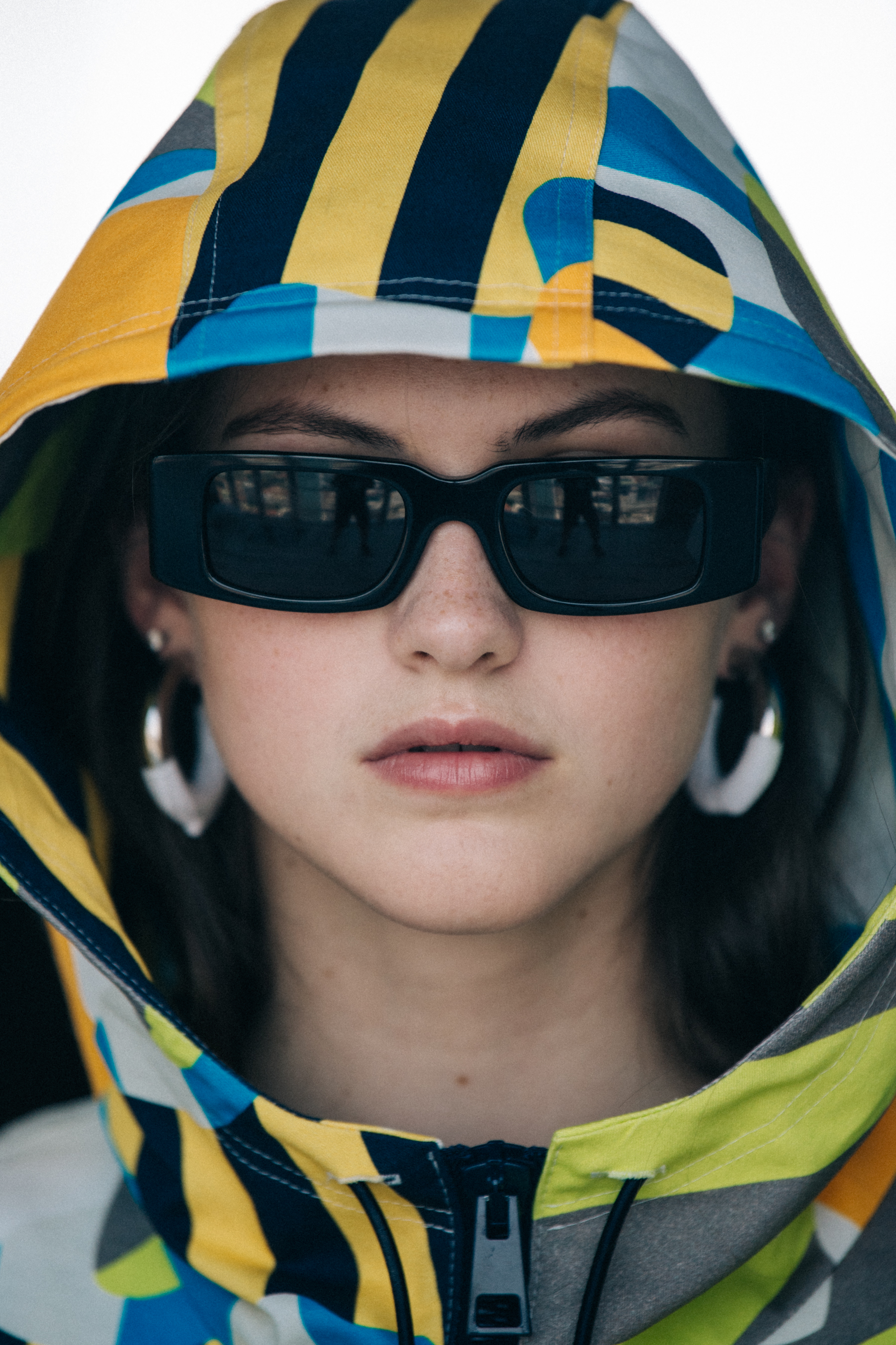 Portrait of model wearing hood at Sunnei