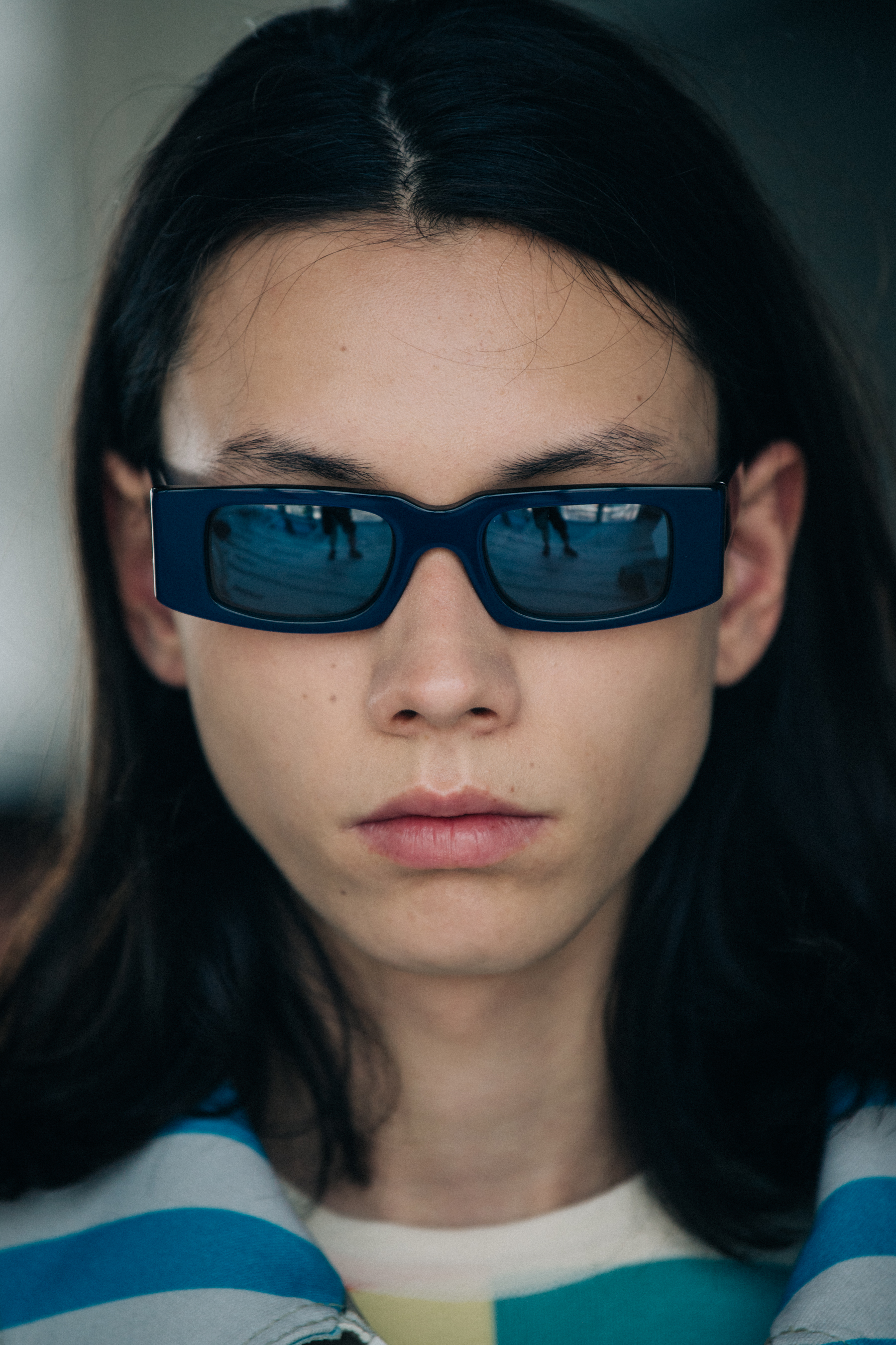 Portrait of model wearing sunglasses at Sunnei
