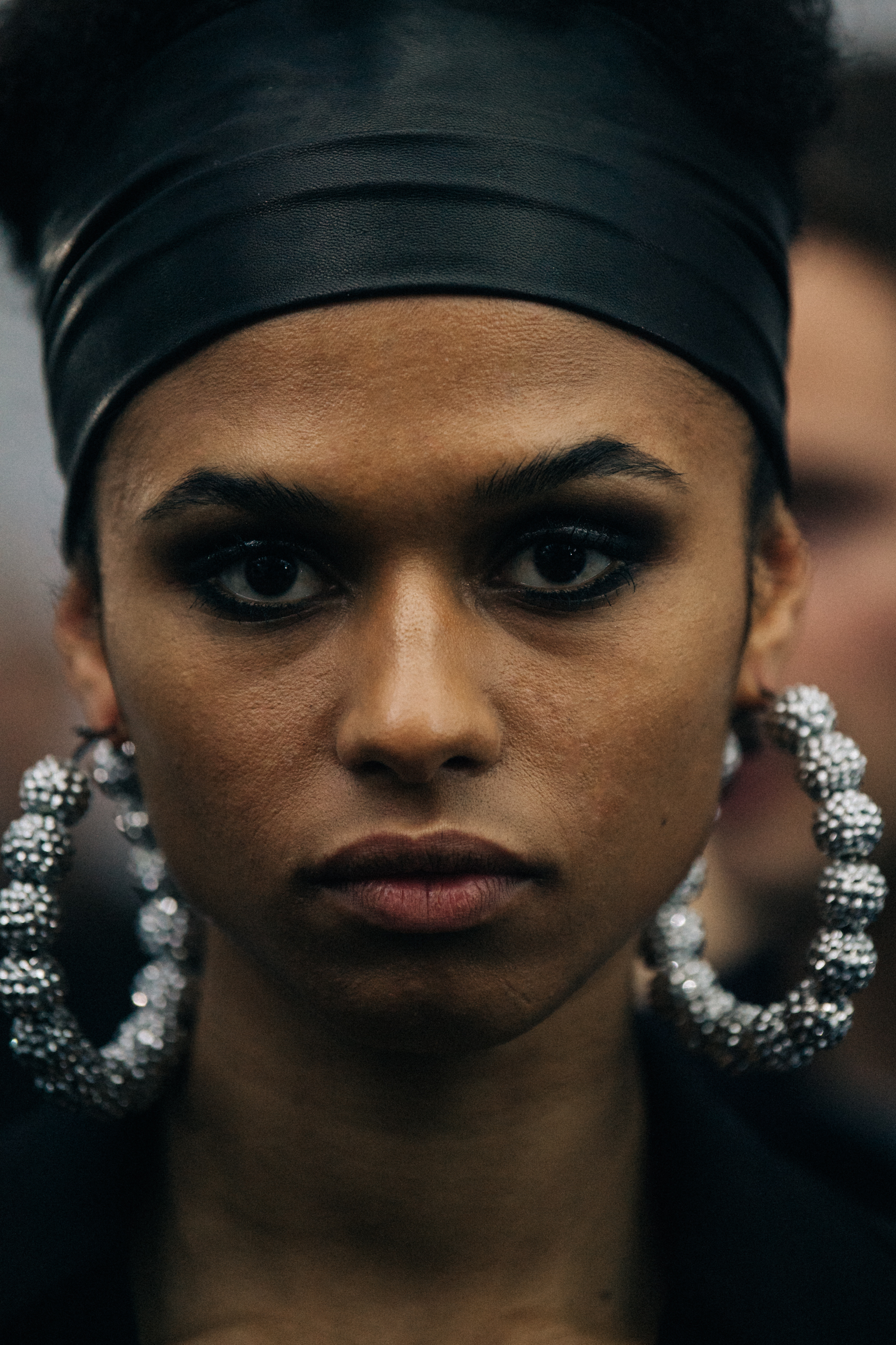 Portrait of model with large hoop earrings