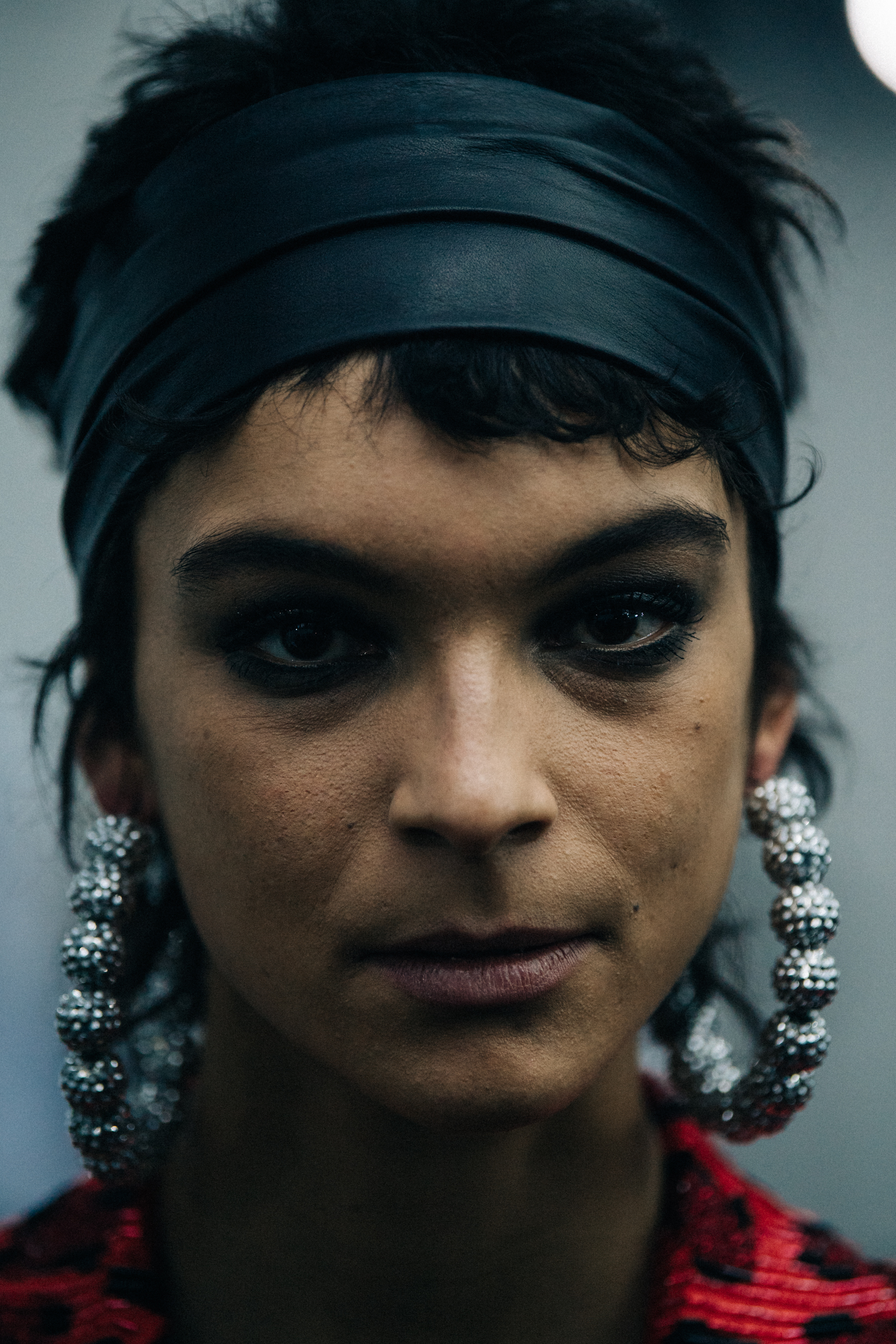 Portrait of model with large hoop earrings