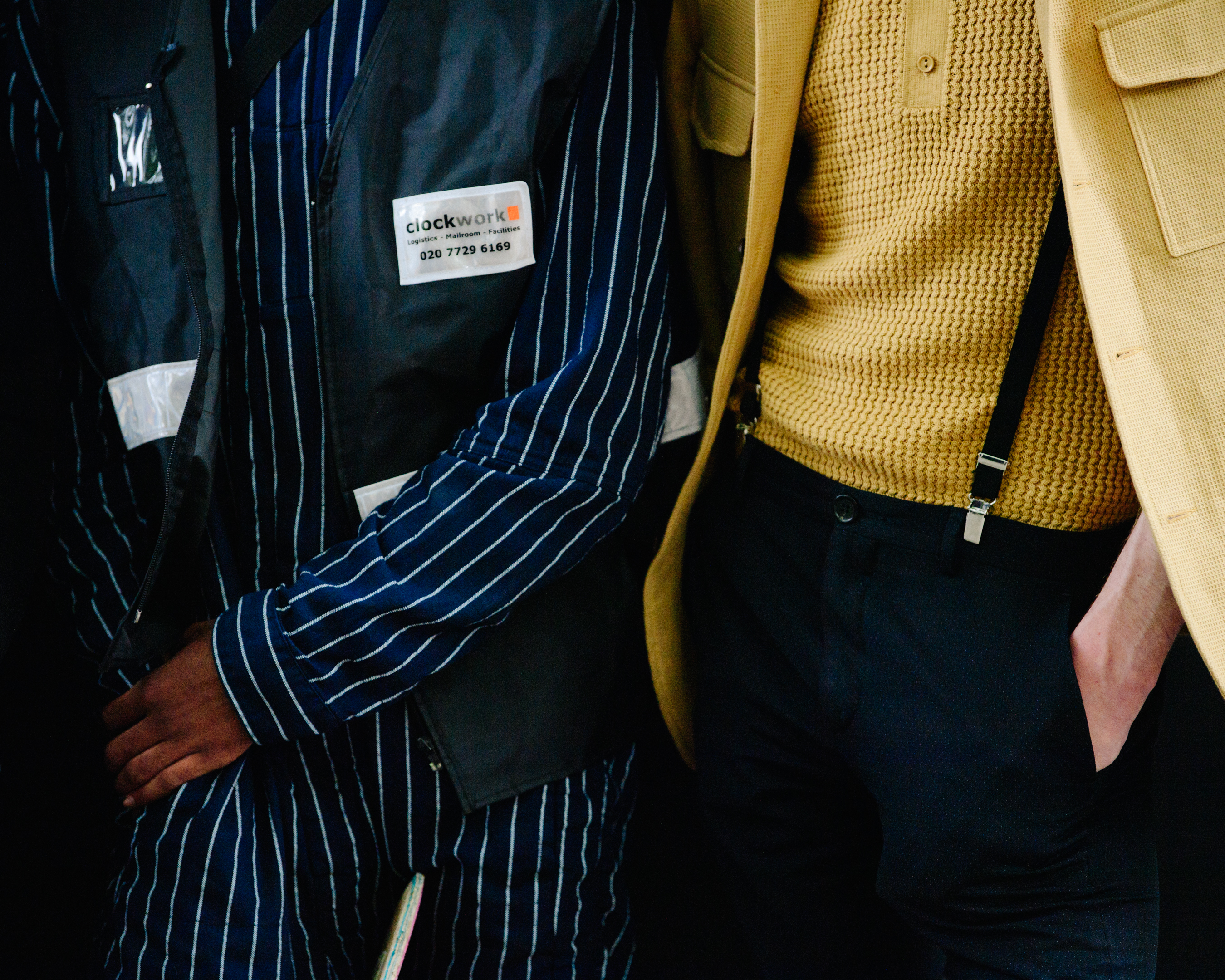 Men wearing dark outfits