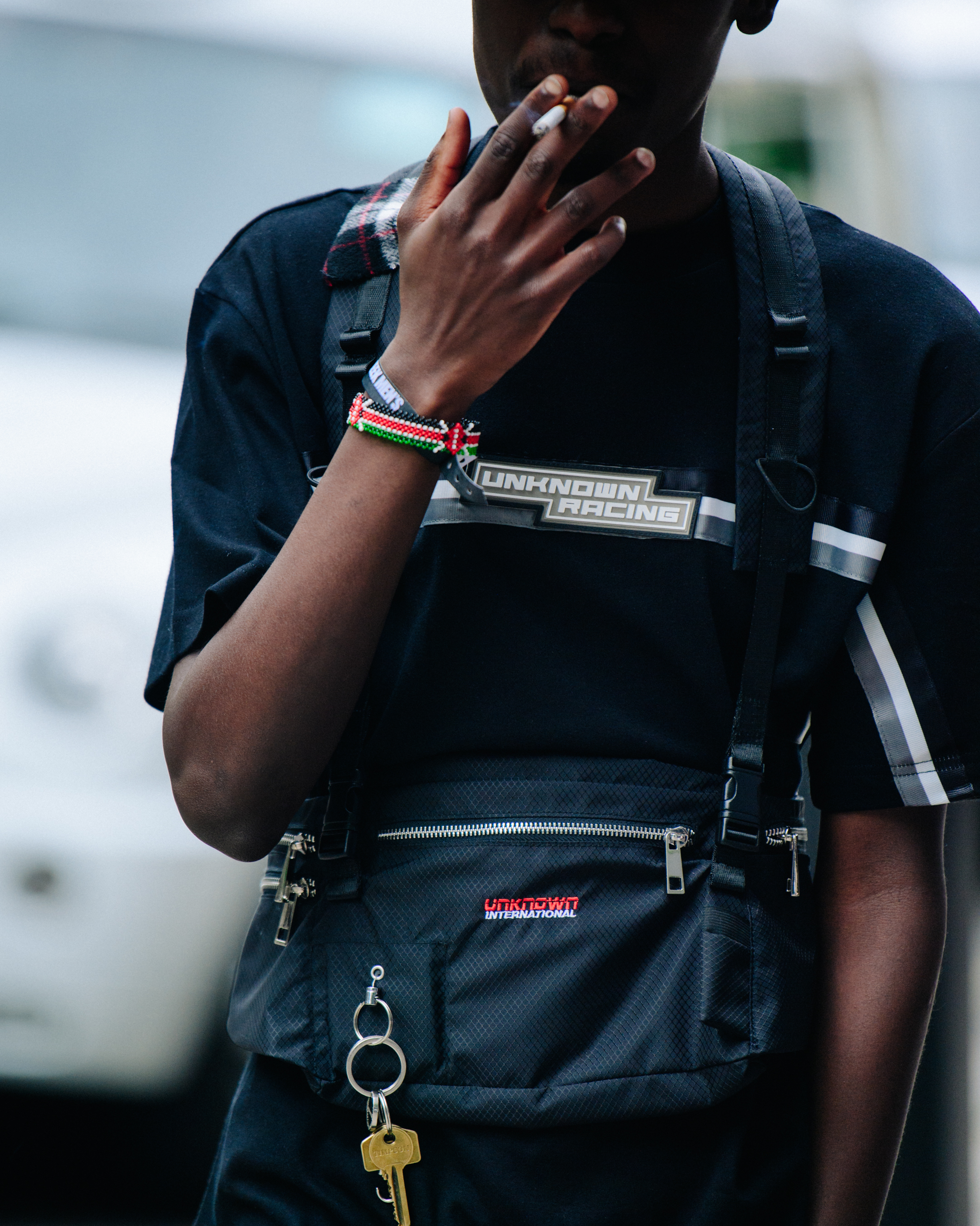 Man wearing black satchel