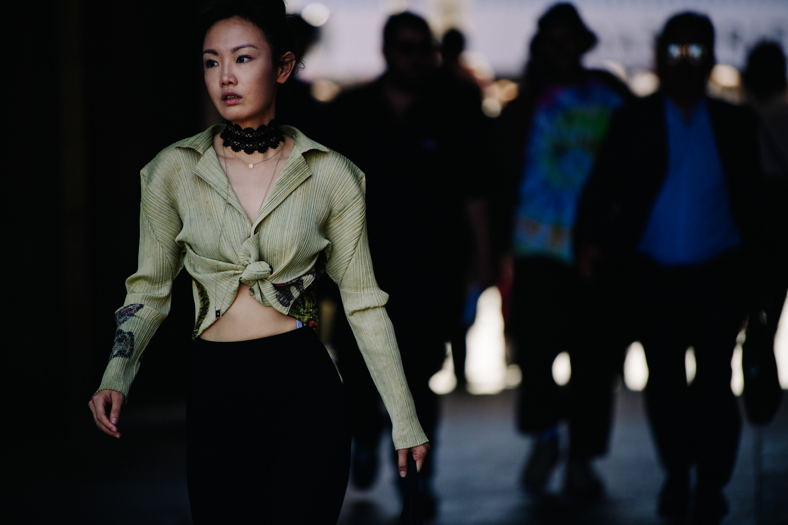 Asian woman wearing green top
