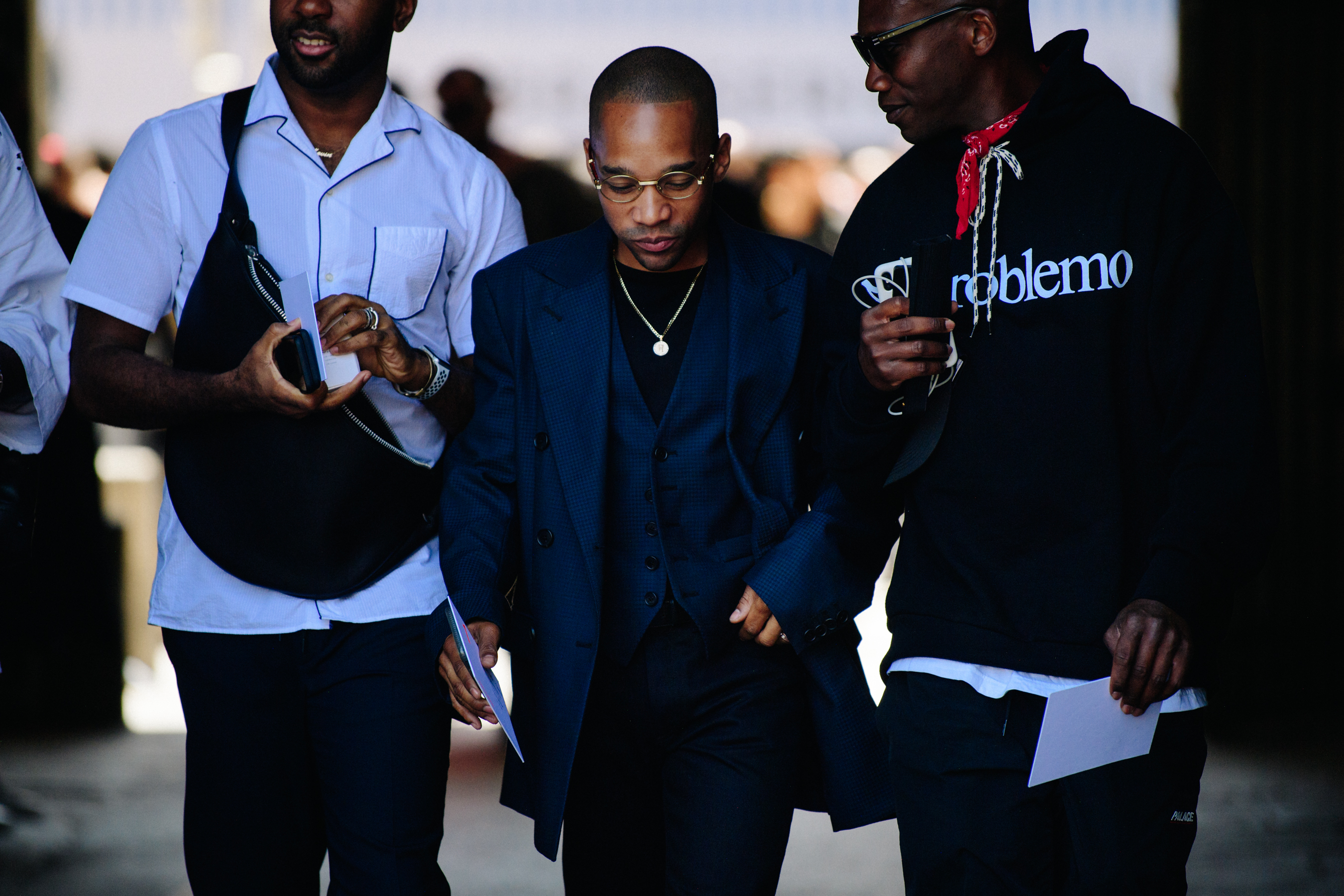 Three men wearing stylish clothes