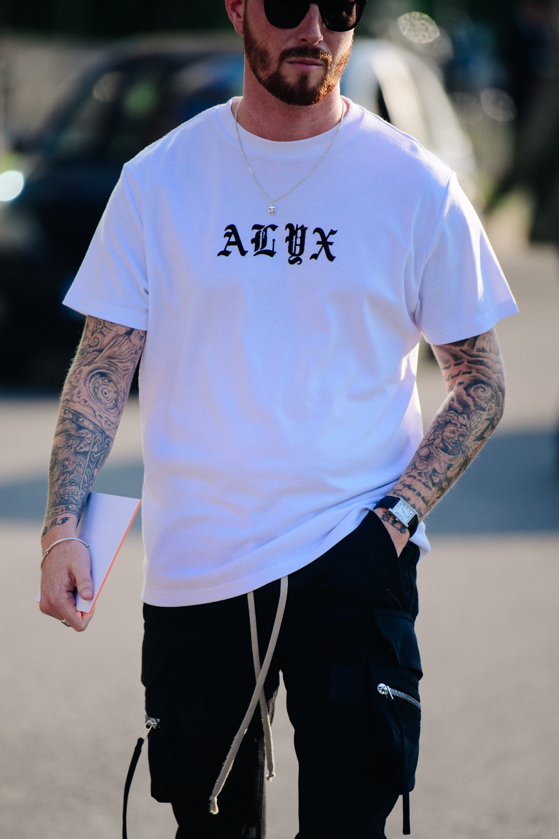 Man wearing Alyx tee shirt