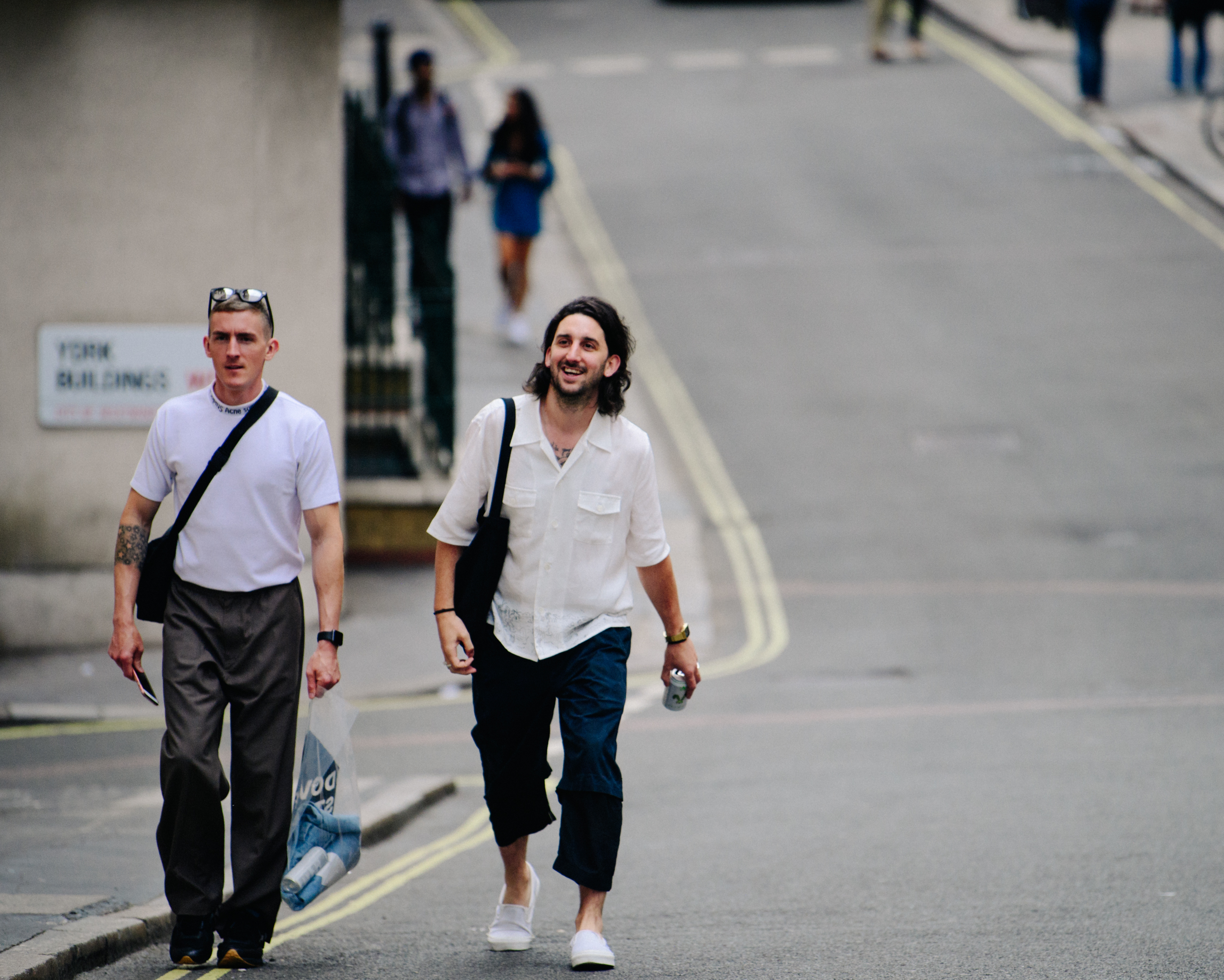 Two men wearing white