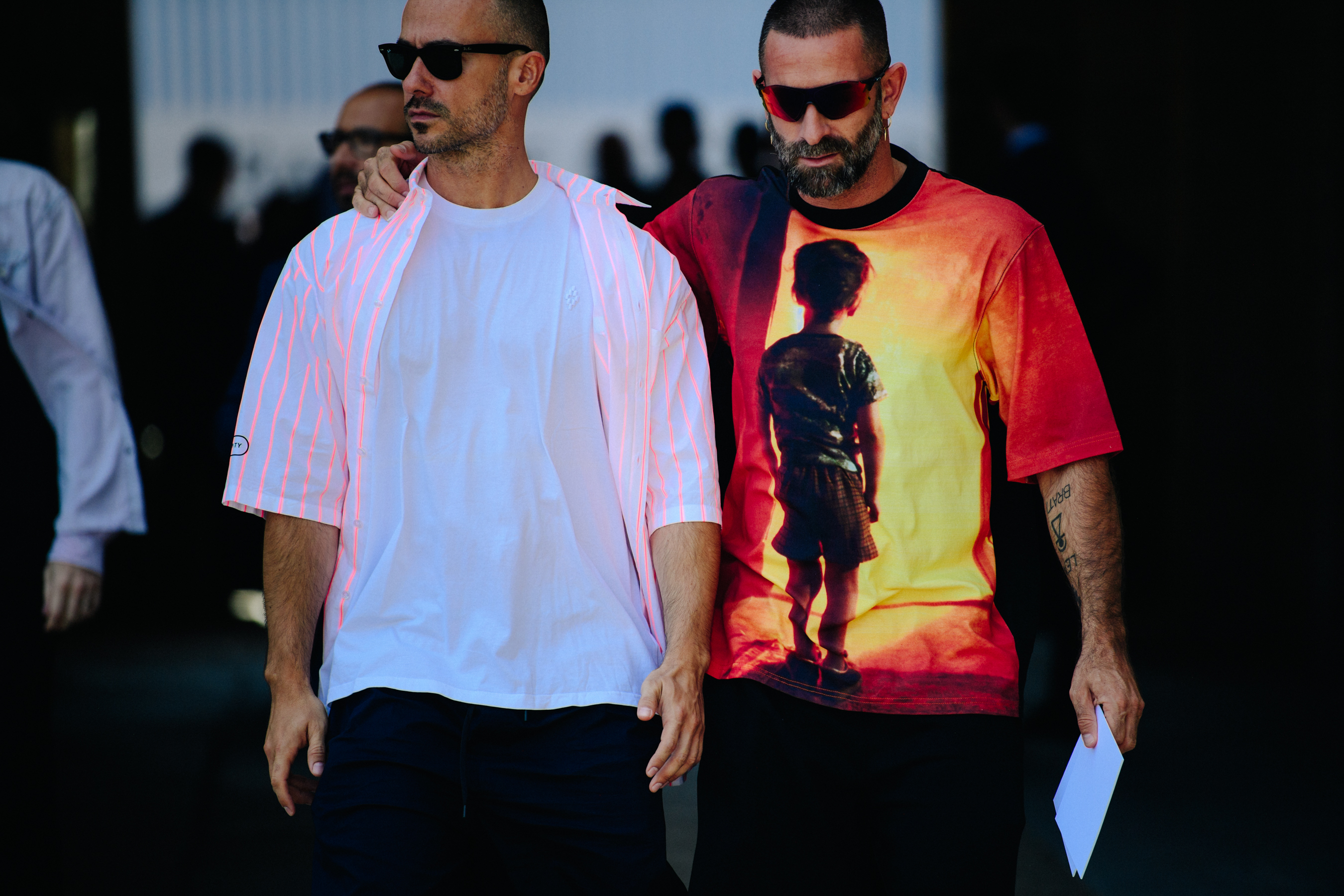 Couple wearing bright shirts