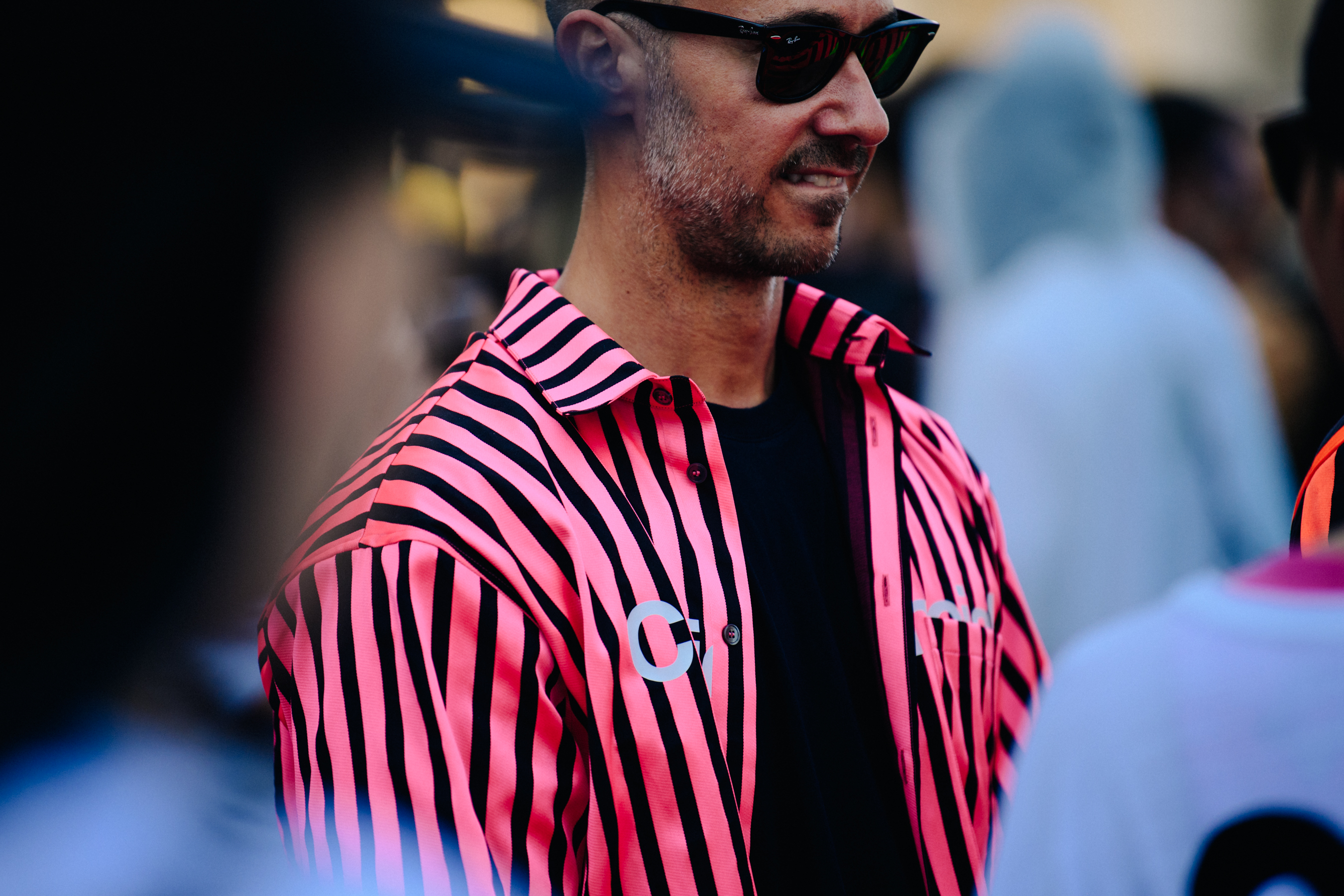 Man wearing pink shirt