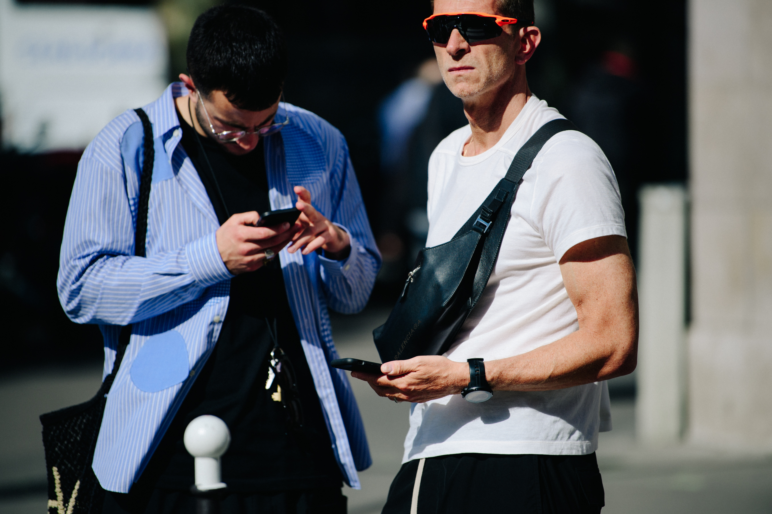 Two men wearing sunglasses