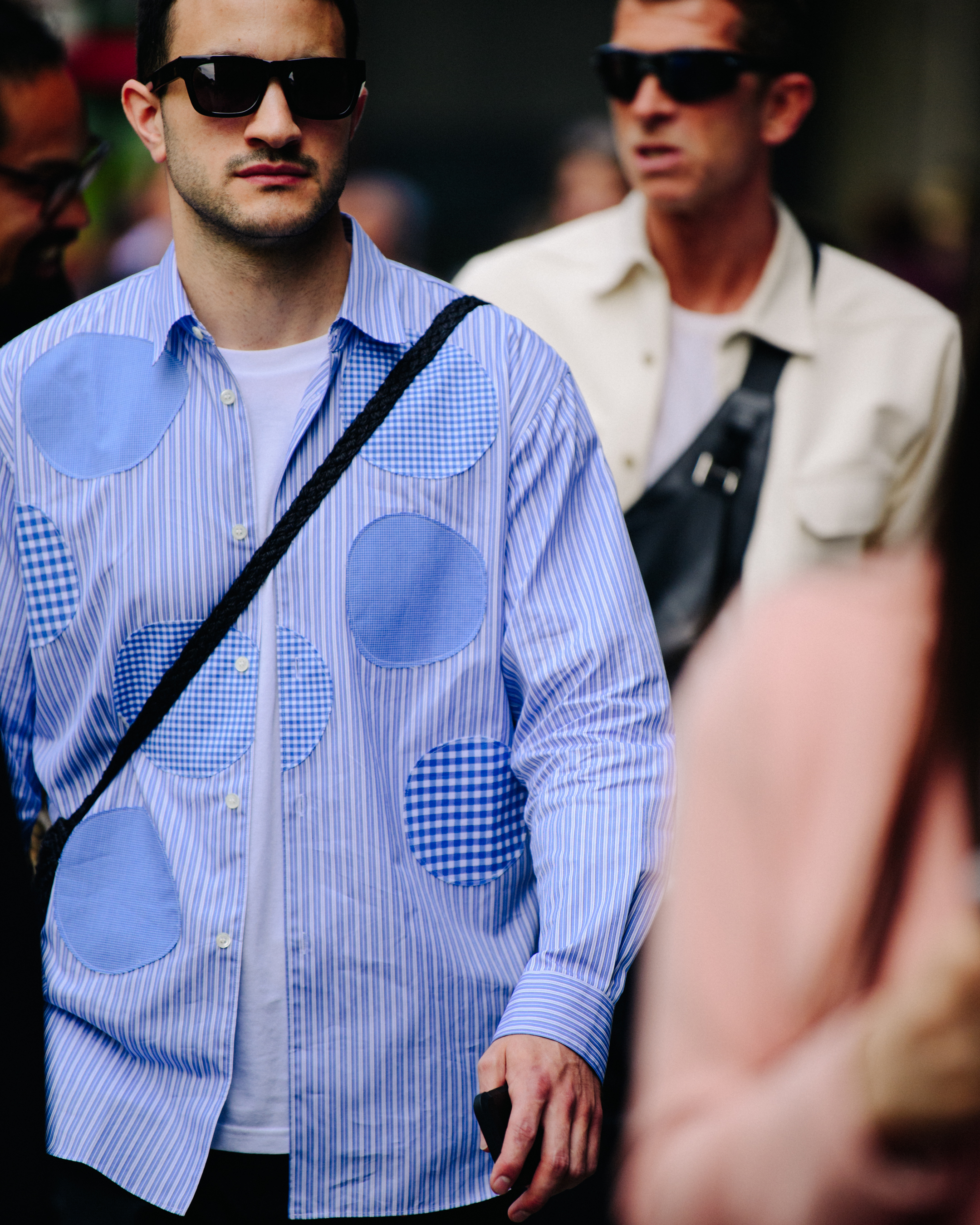 Man wearing blue striped shirt