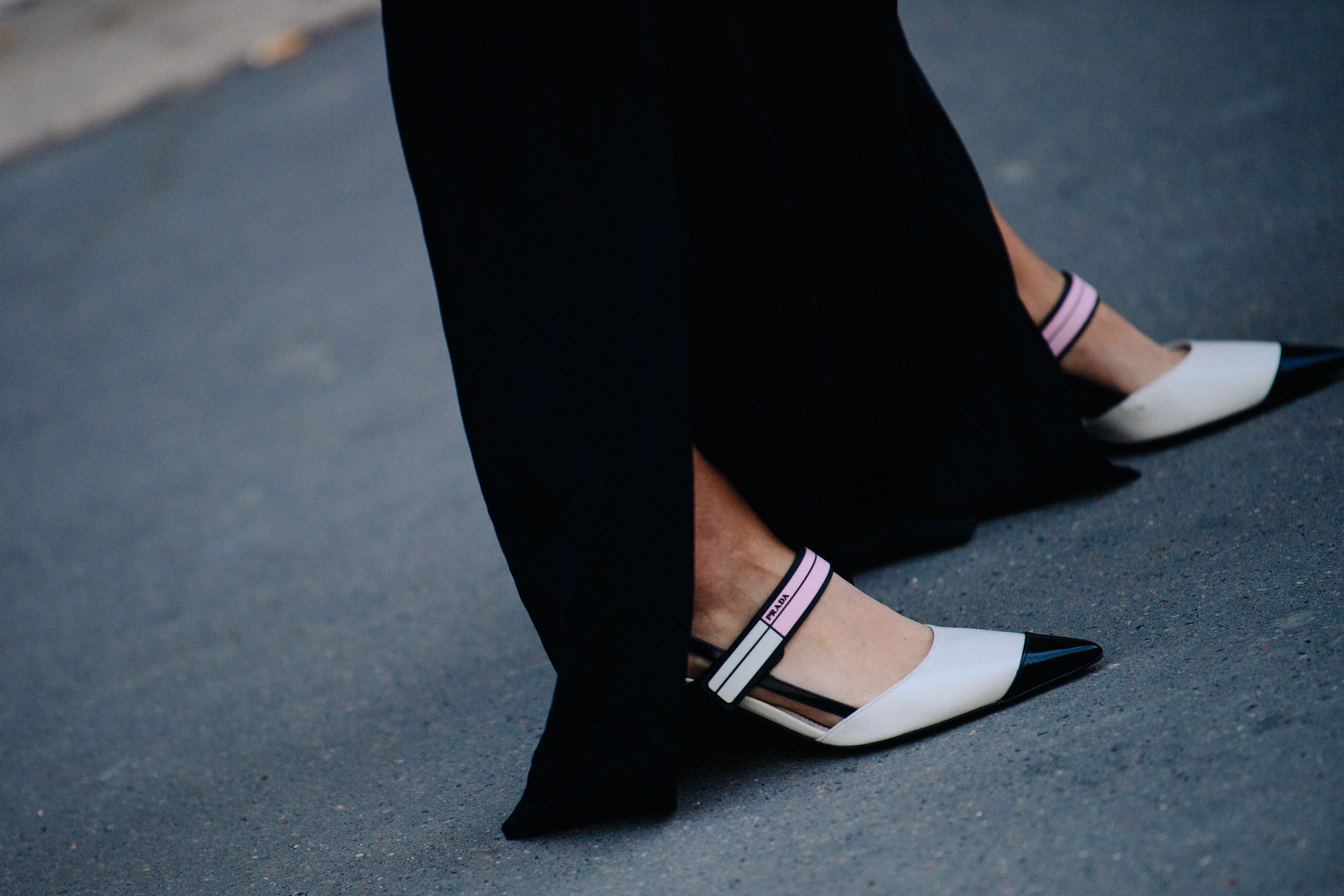 Woman wearing Prada shoes