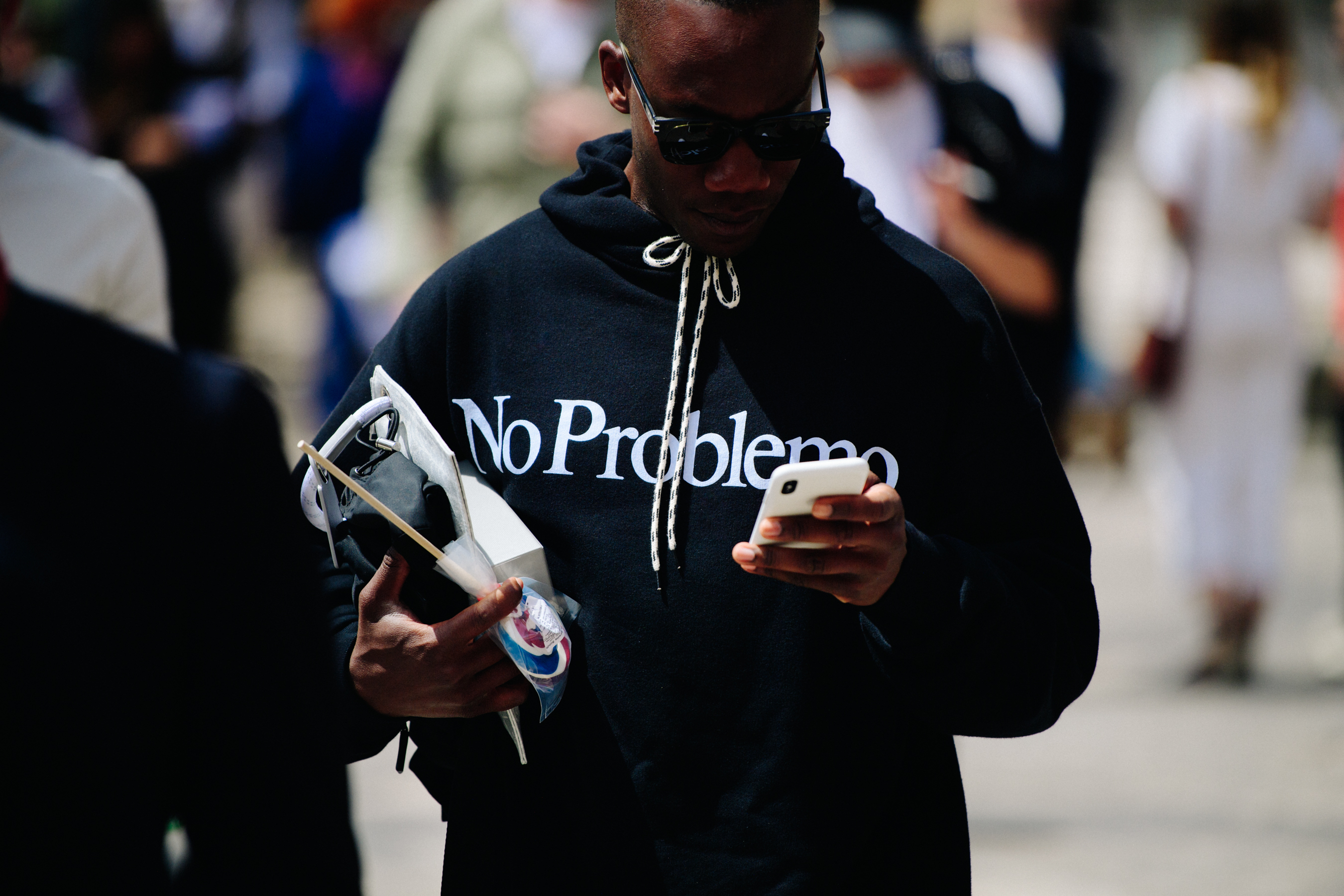 Man wearing black graphic hoodie