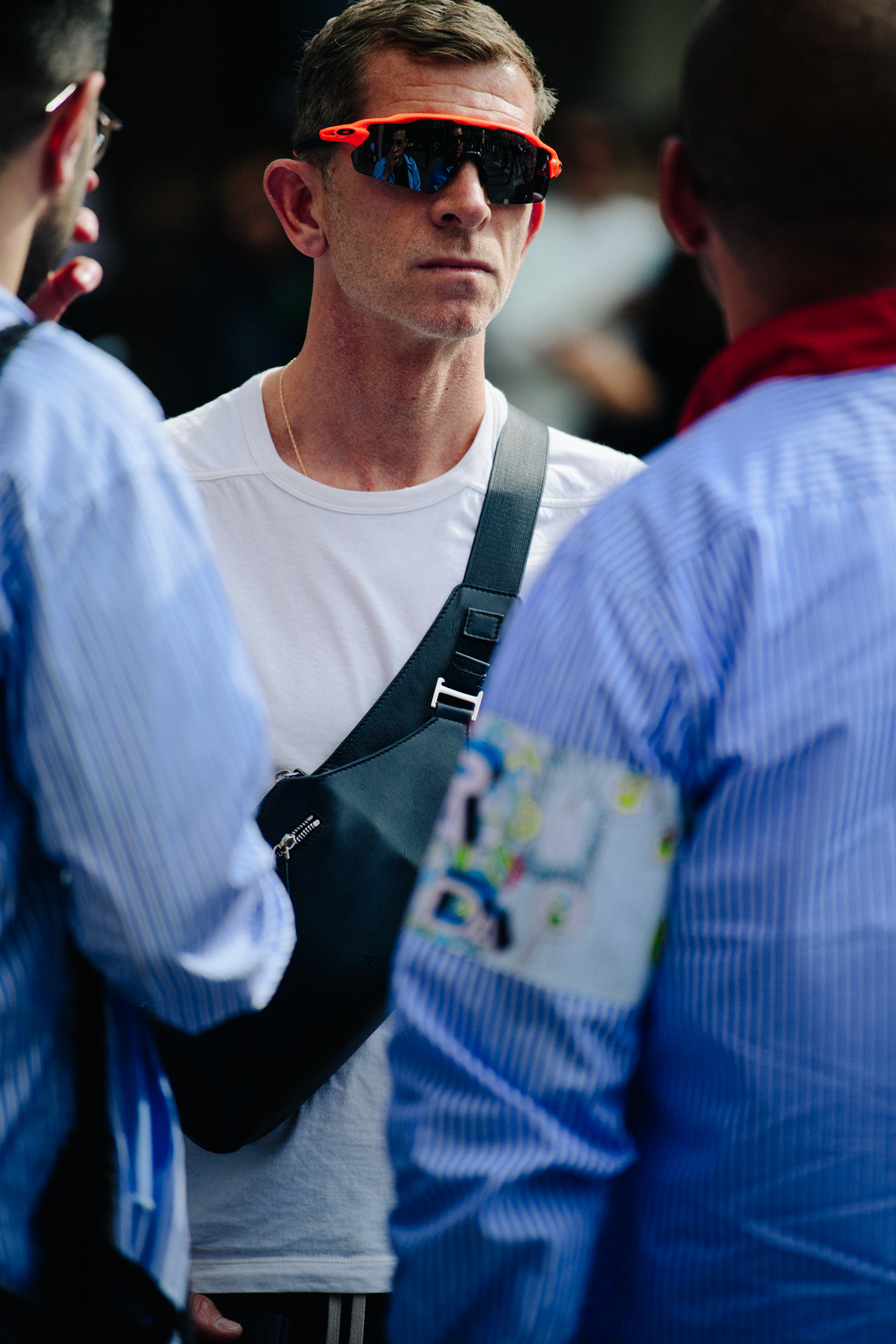 Buyer wearing orange sunglasses