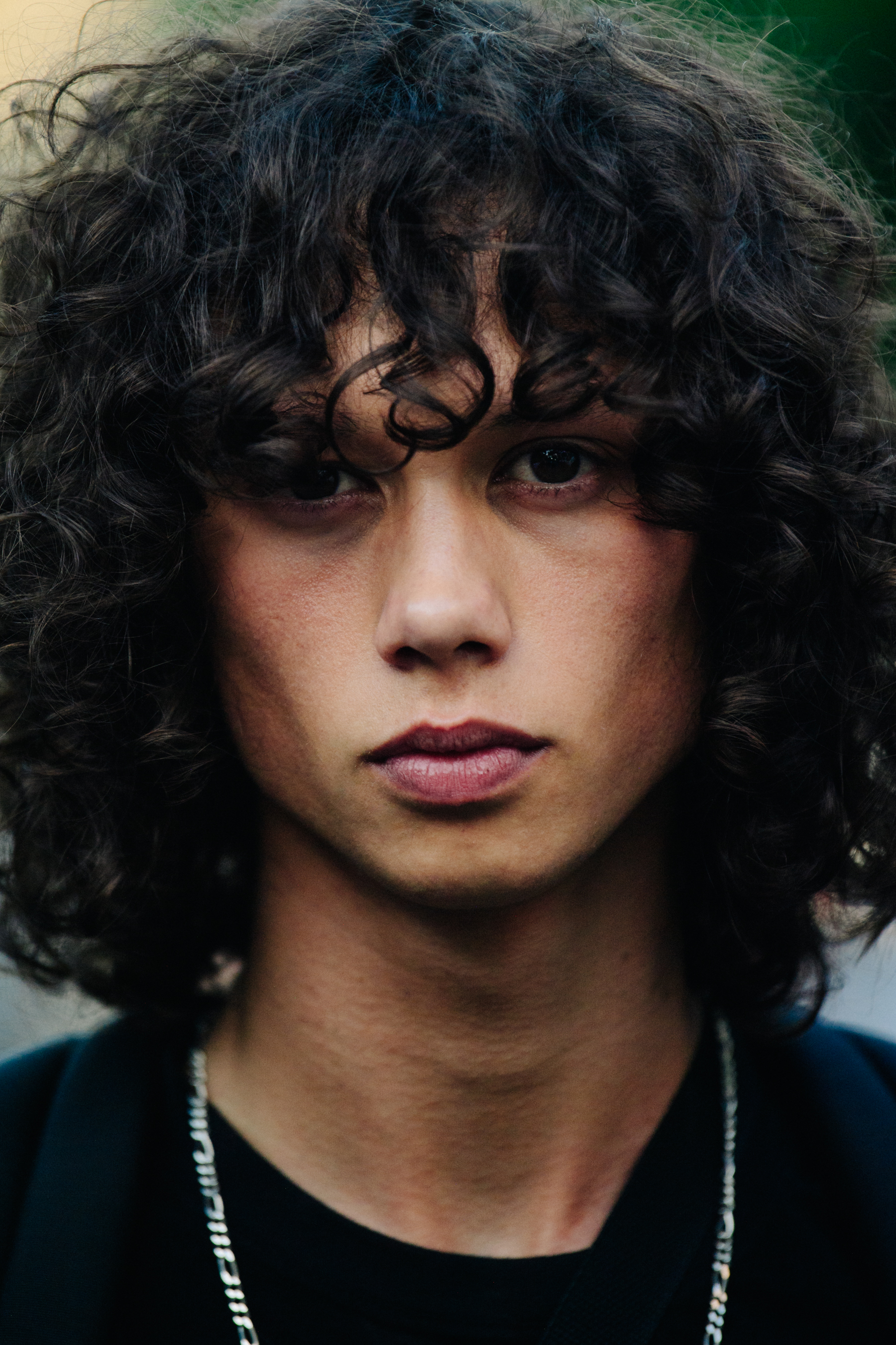Portrait of model with thick curly hair