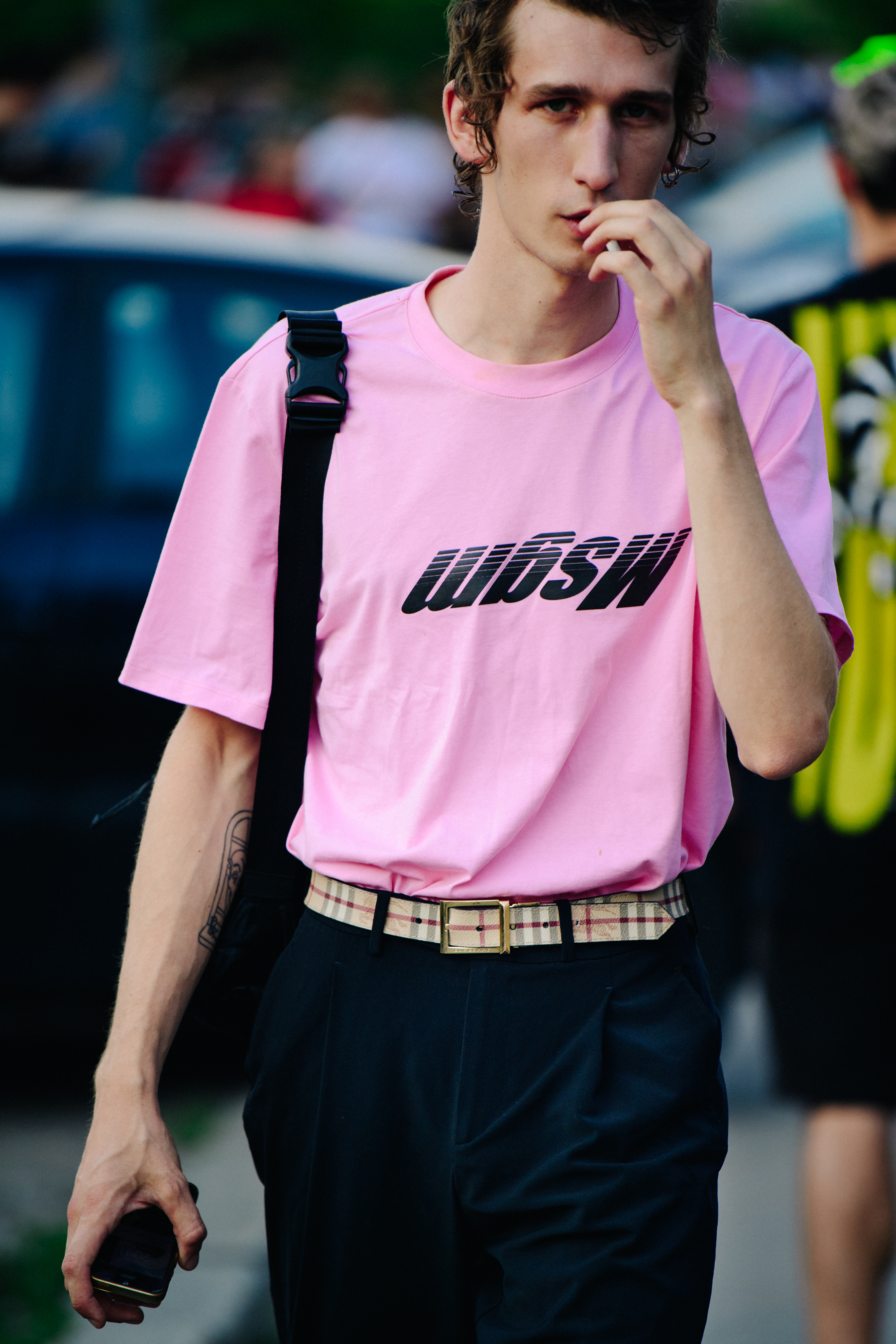 Model wearing pink tee shirt