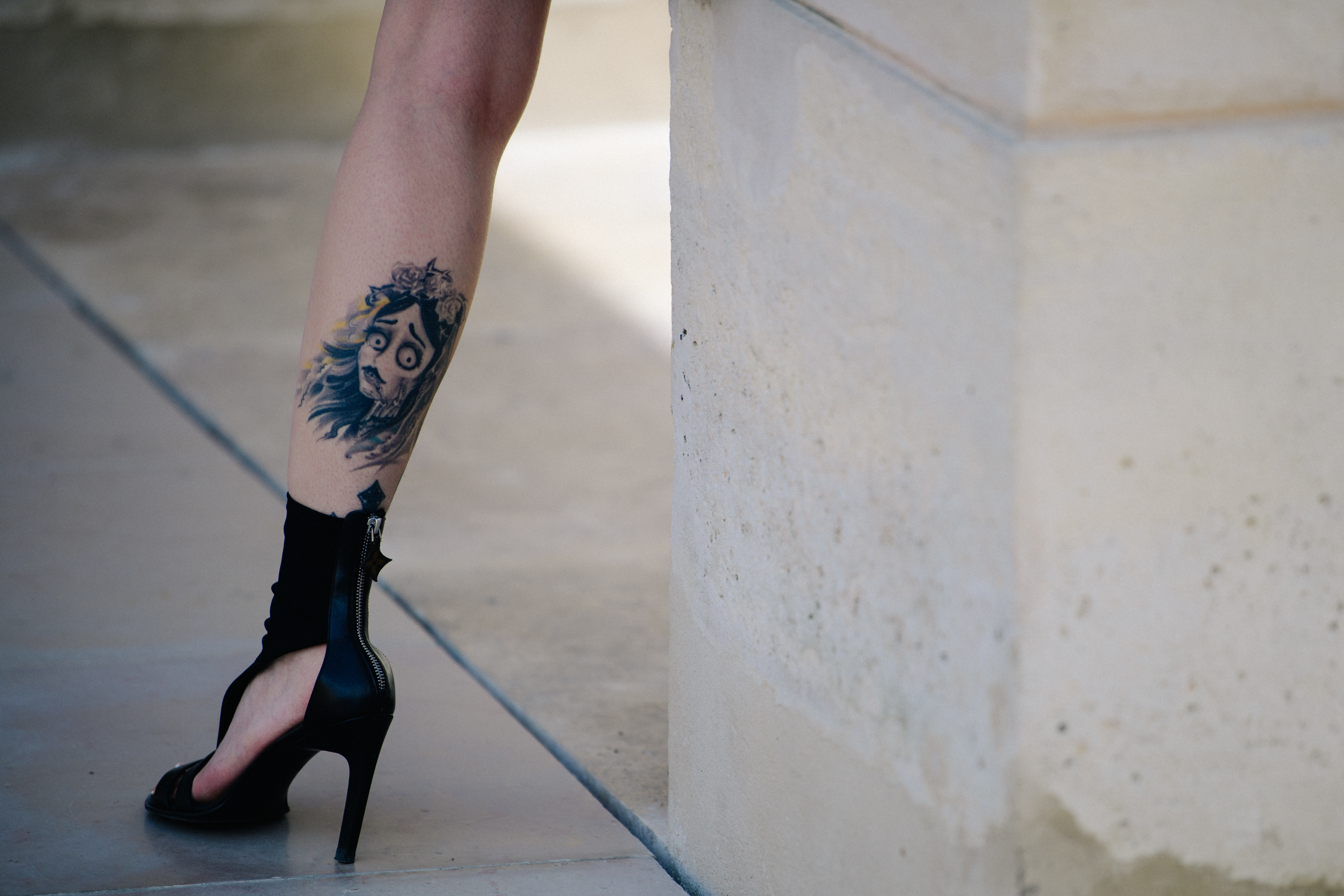 Woman wearing black high heels