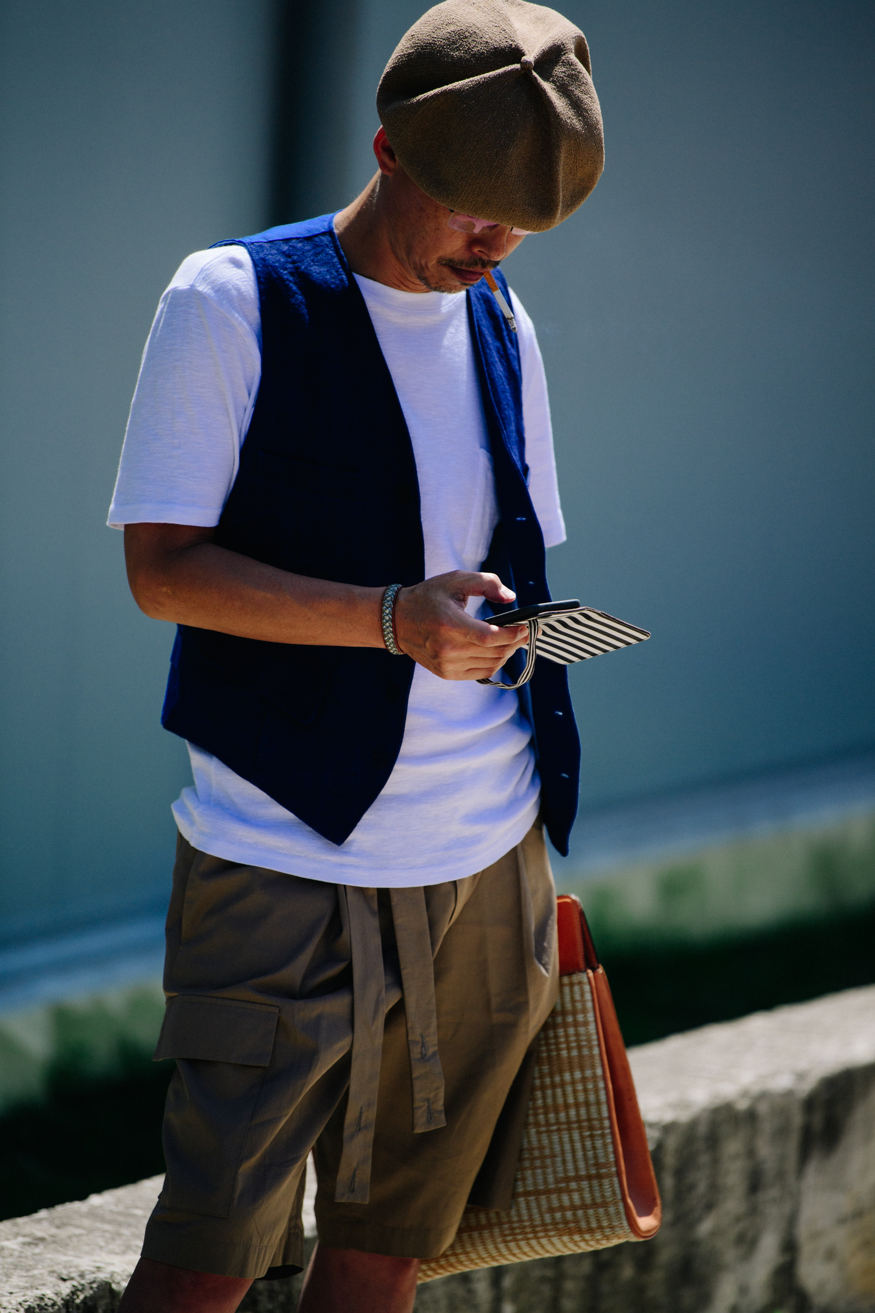 Man wearing navy waistcoat