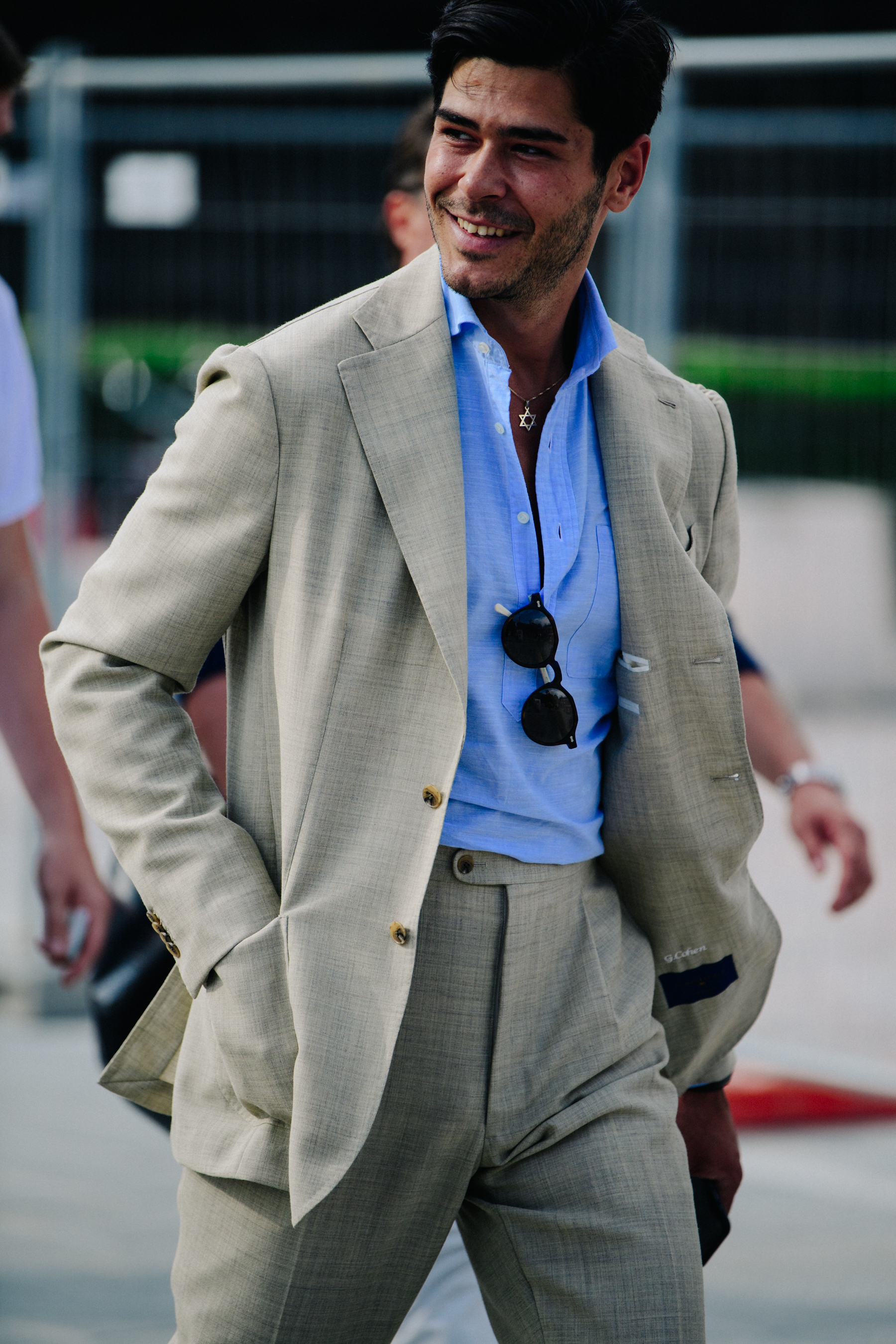 Man wearing light suit