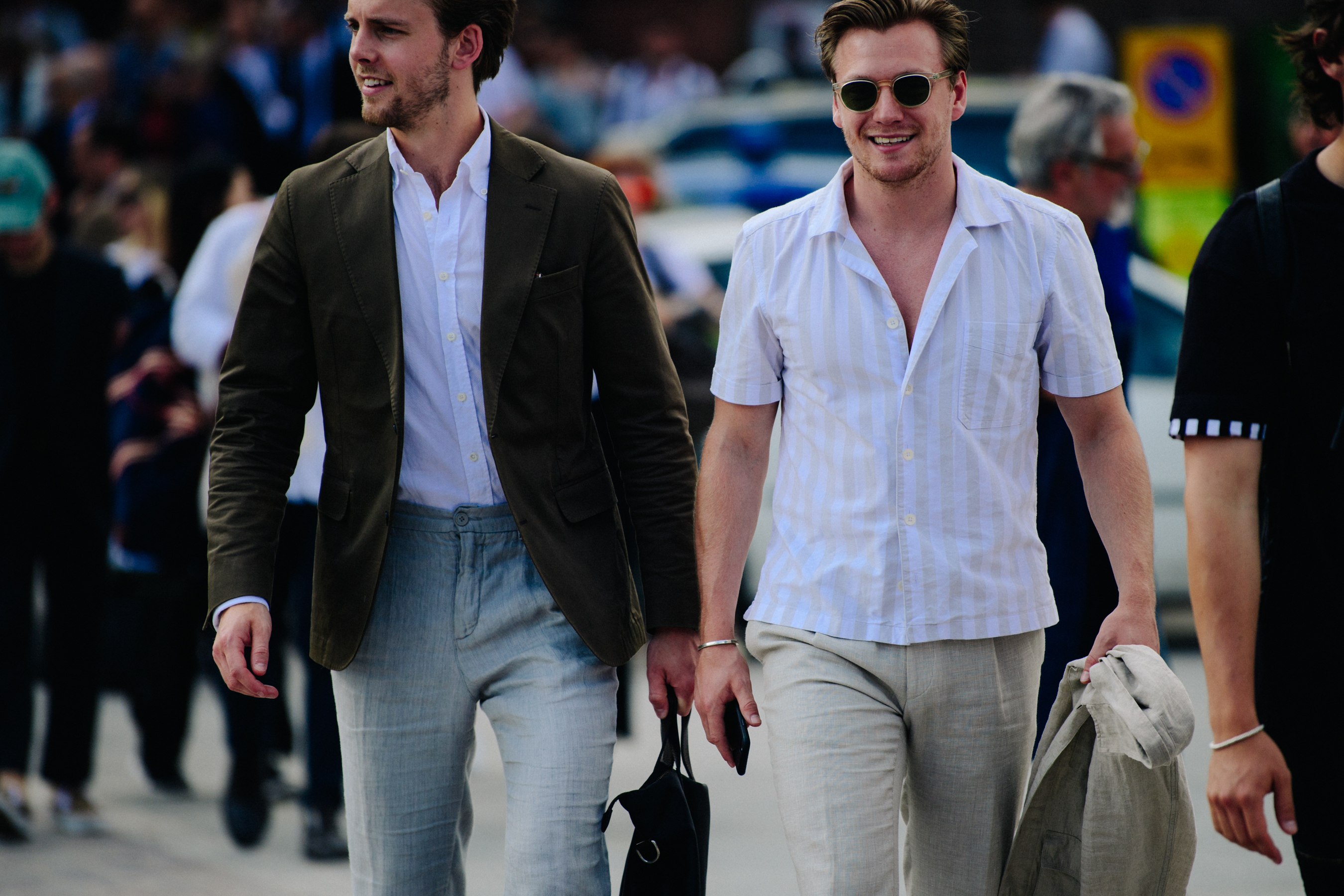 Two men wearing white shirts