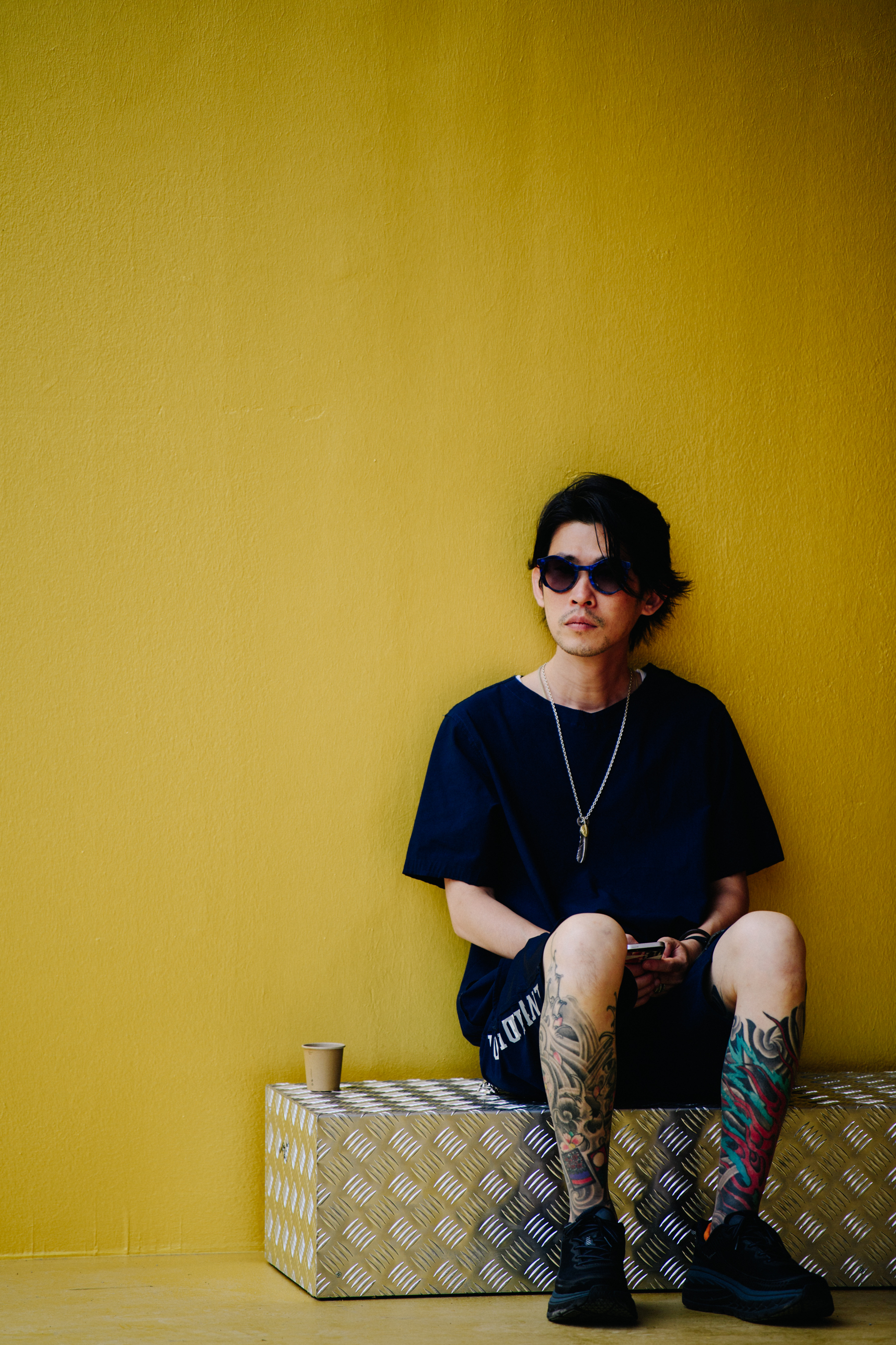 Man with leg tattoos