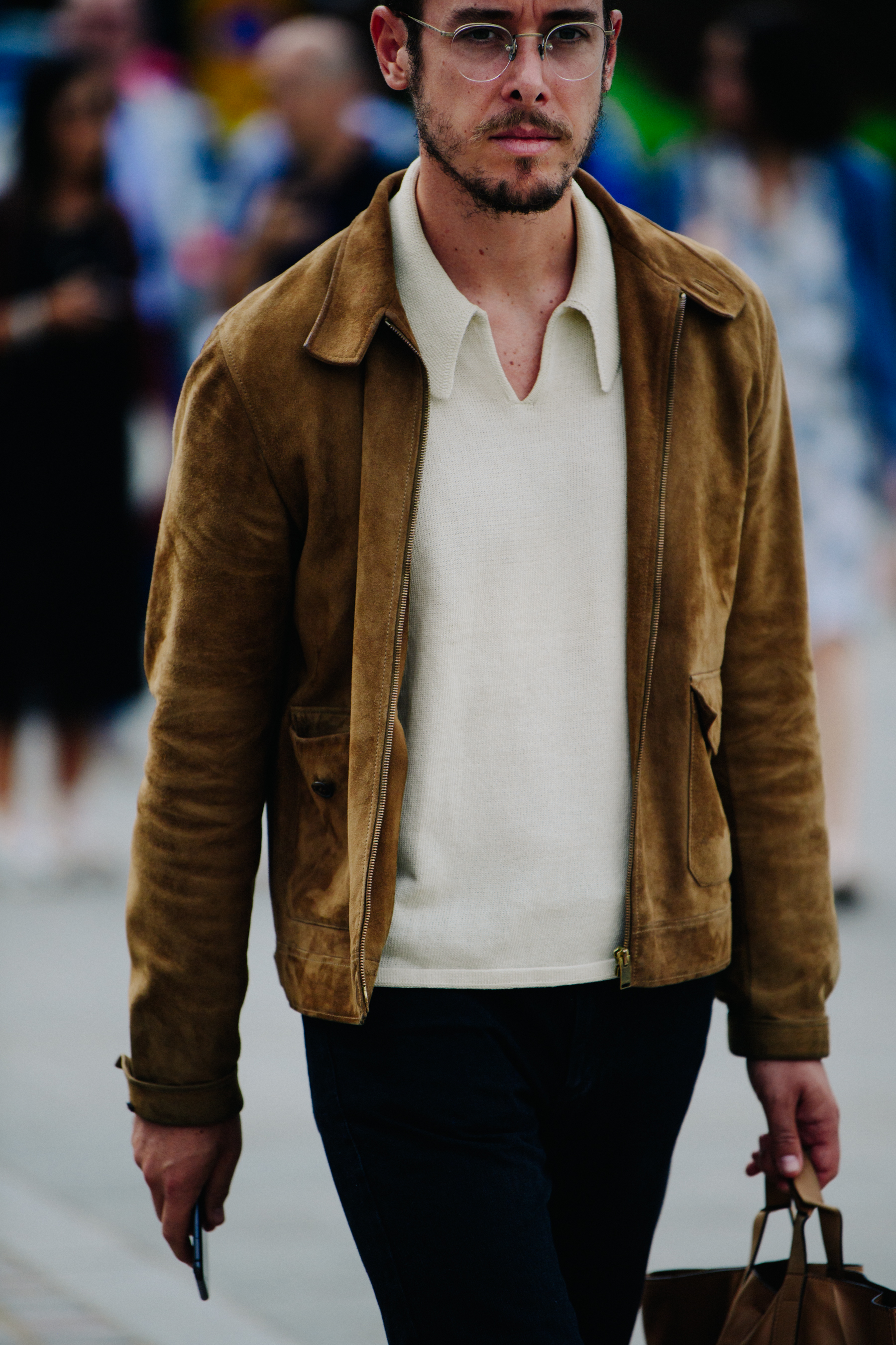 Man wearing suede jacket
