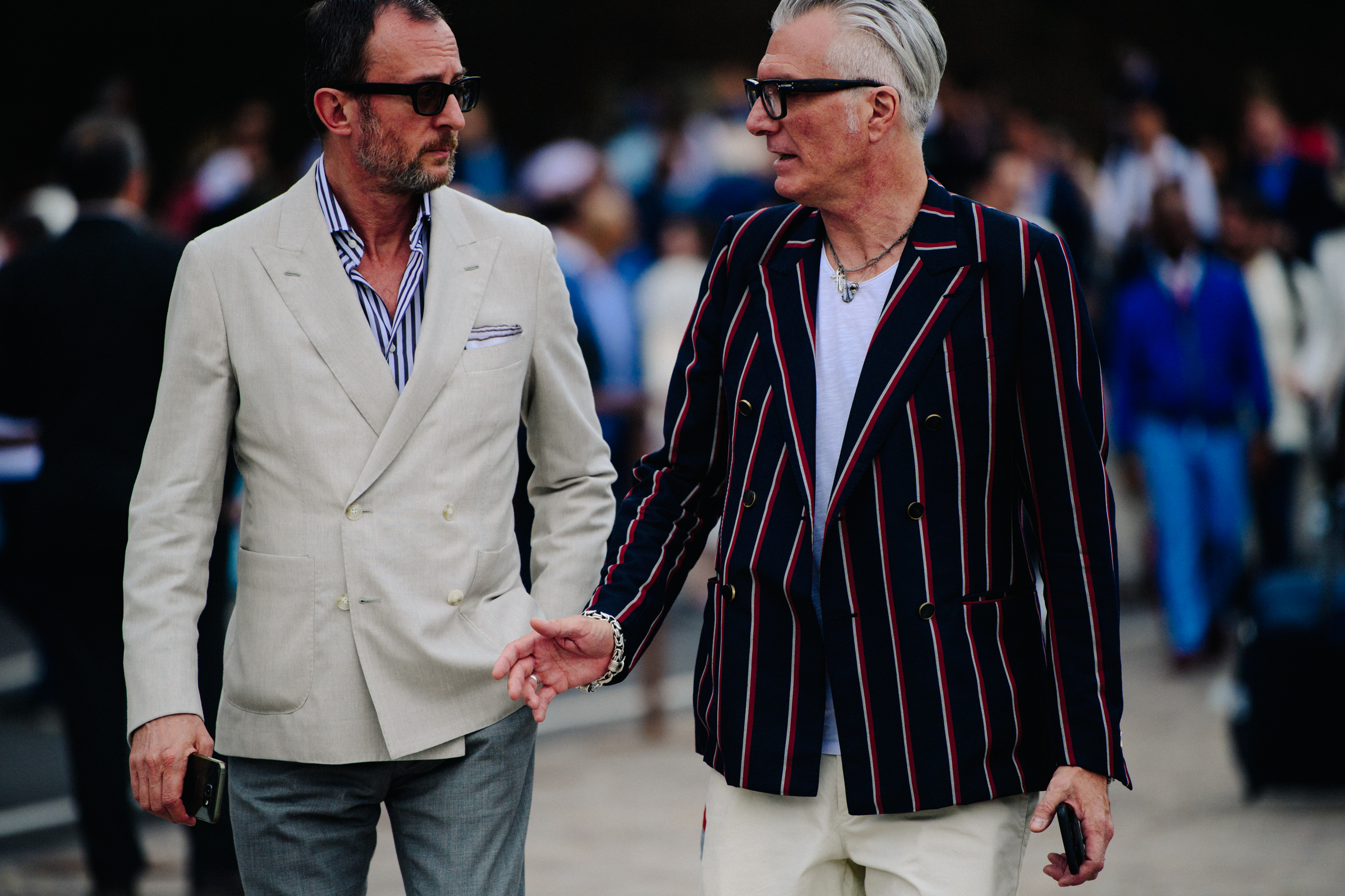 Two men wearing suits