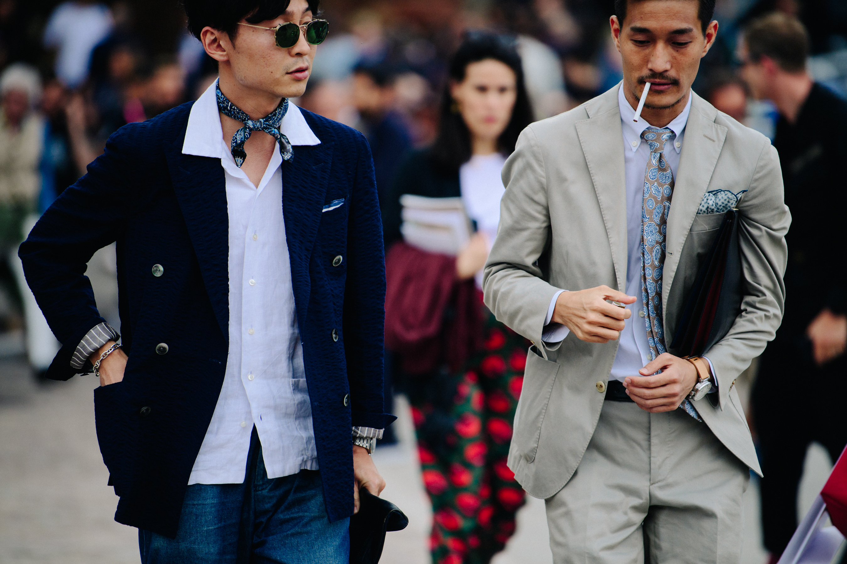 Two men wearing suits