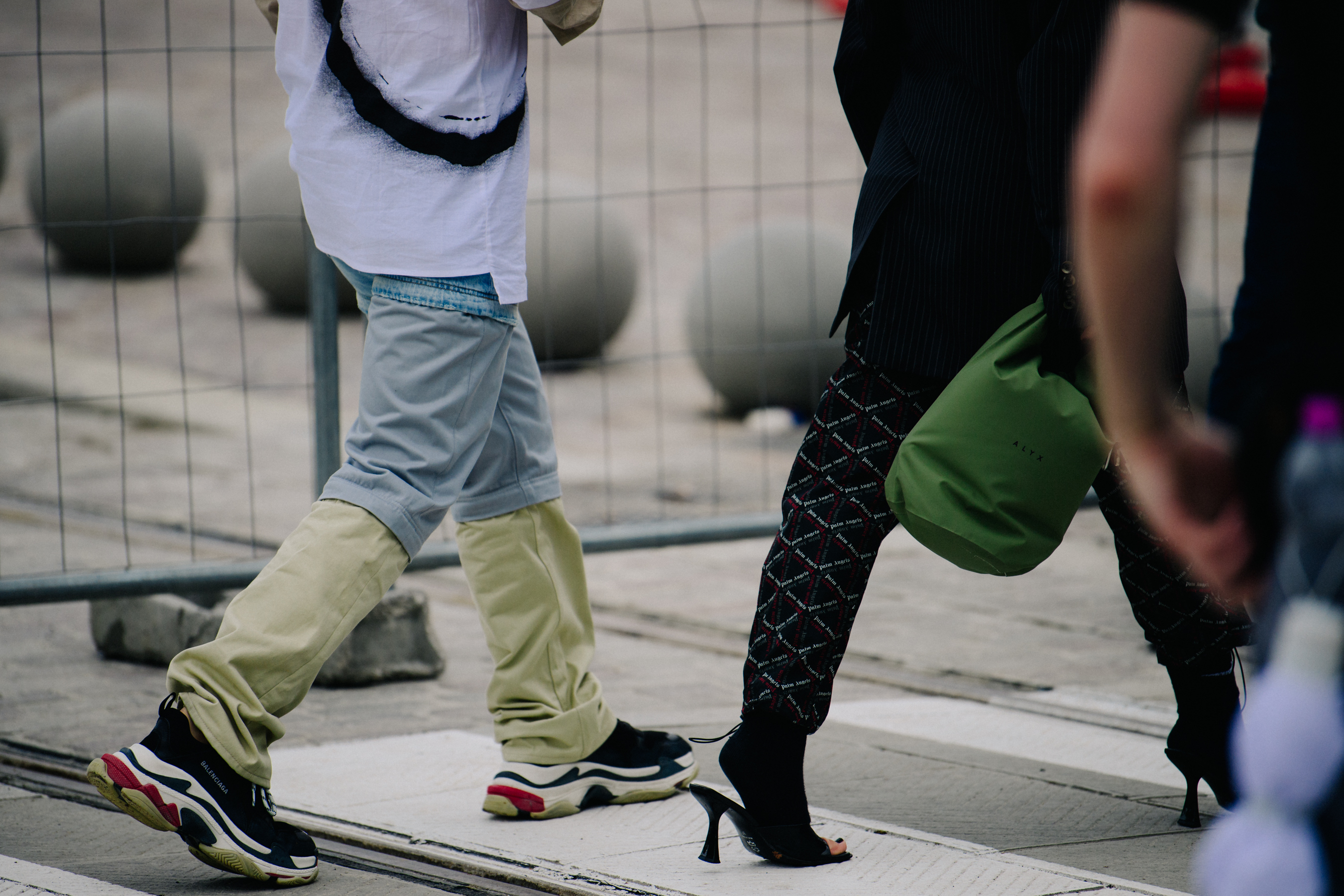 Couple wearing Balenciaga and Palm Angels